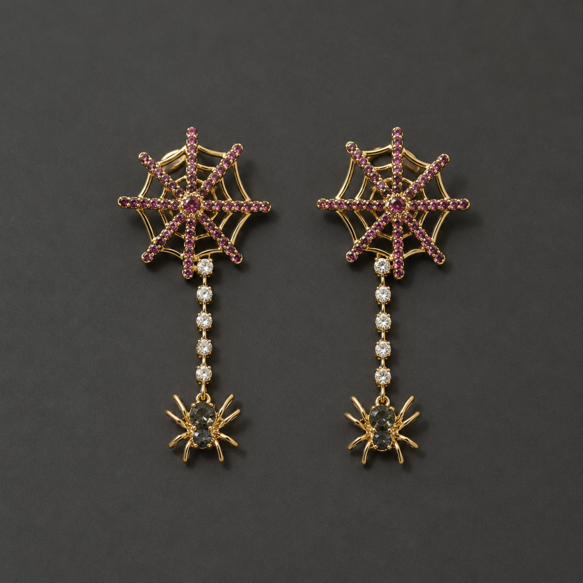 a pair of dangle spider web earrings.