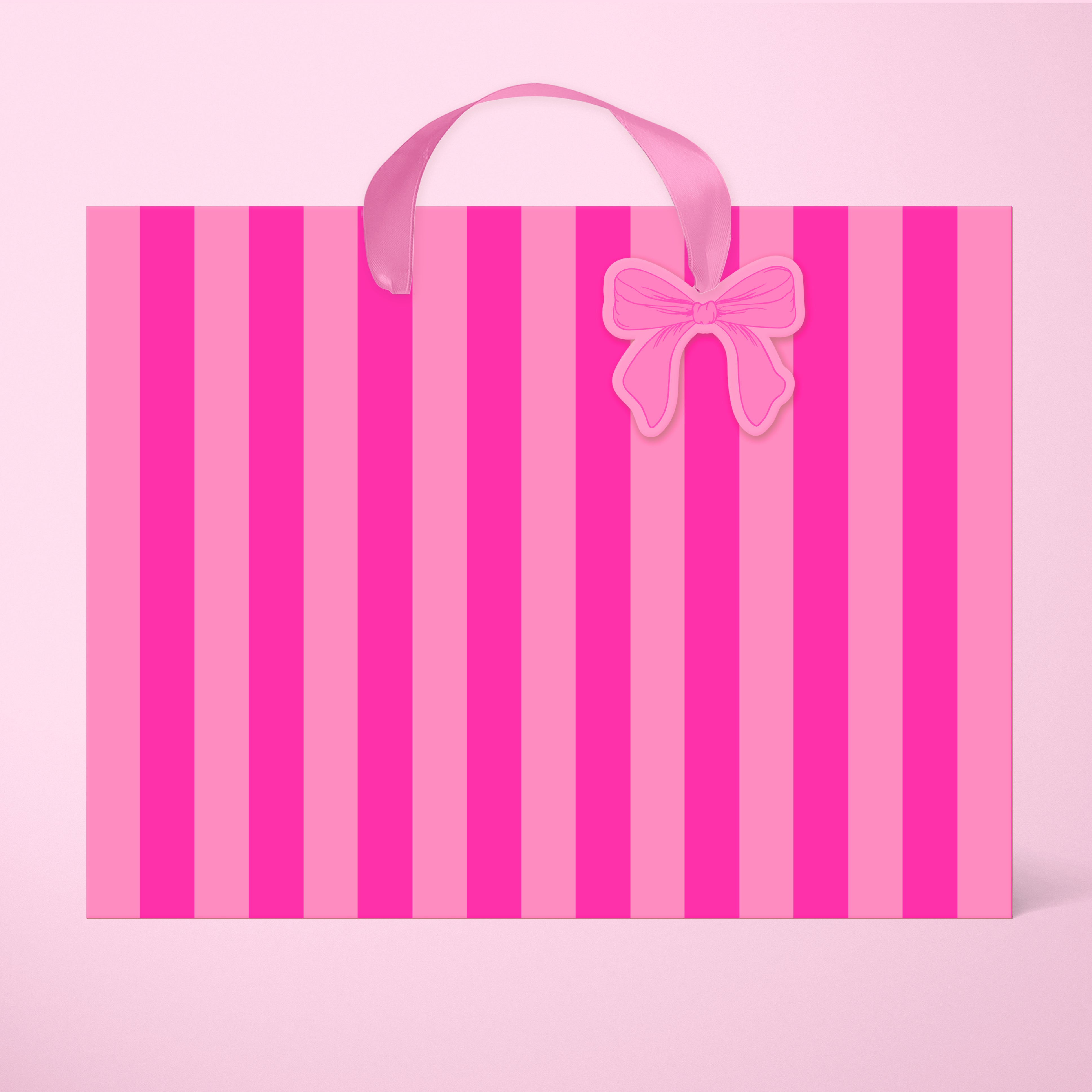 A light pink and hot pink striped gift bag ribbon handles and a small bow shaped tag.