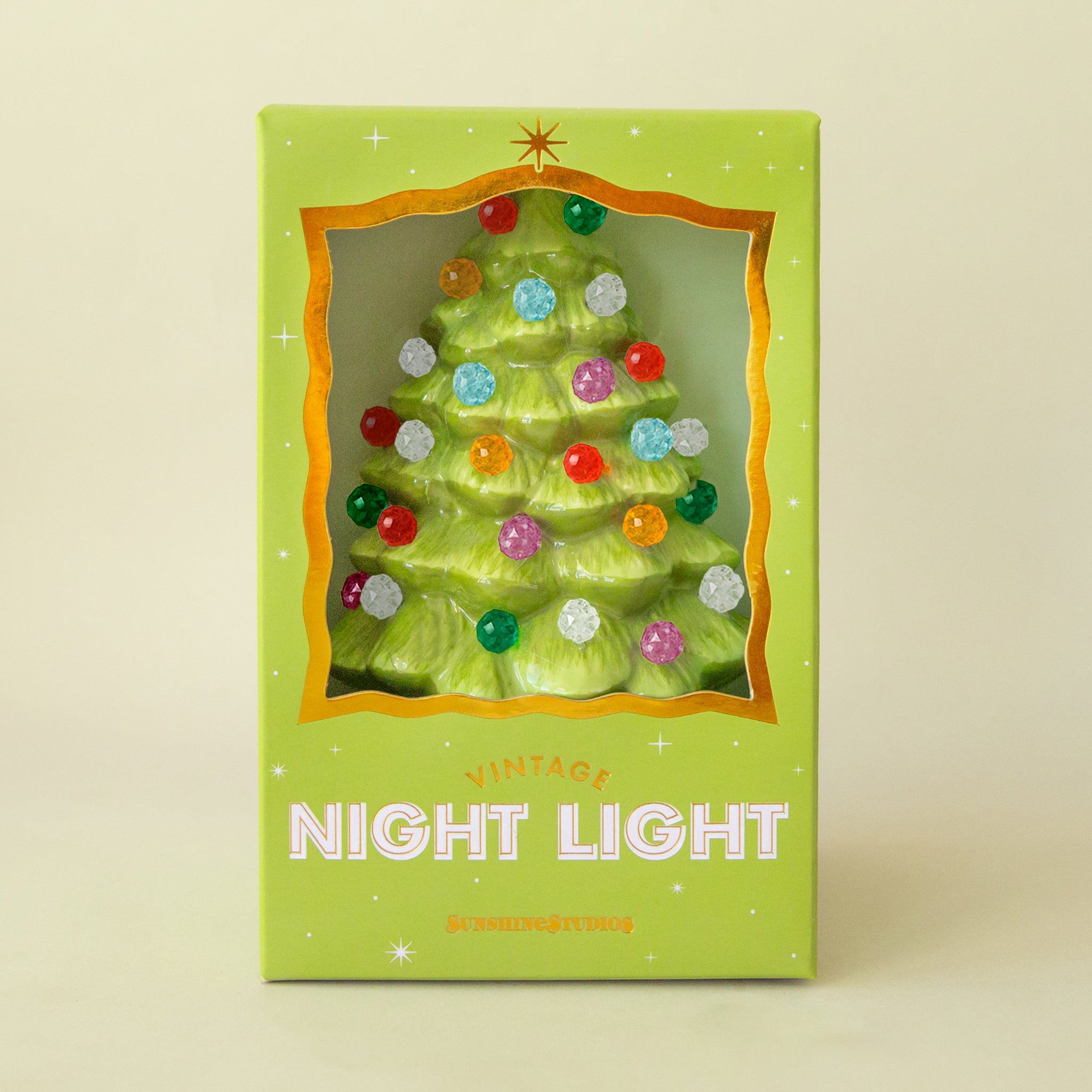 A green tree multi colored night light with sphere shaped lights. 