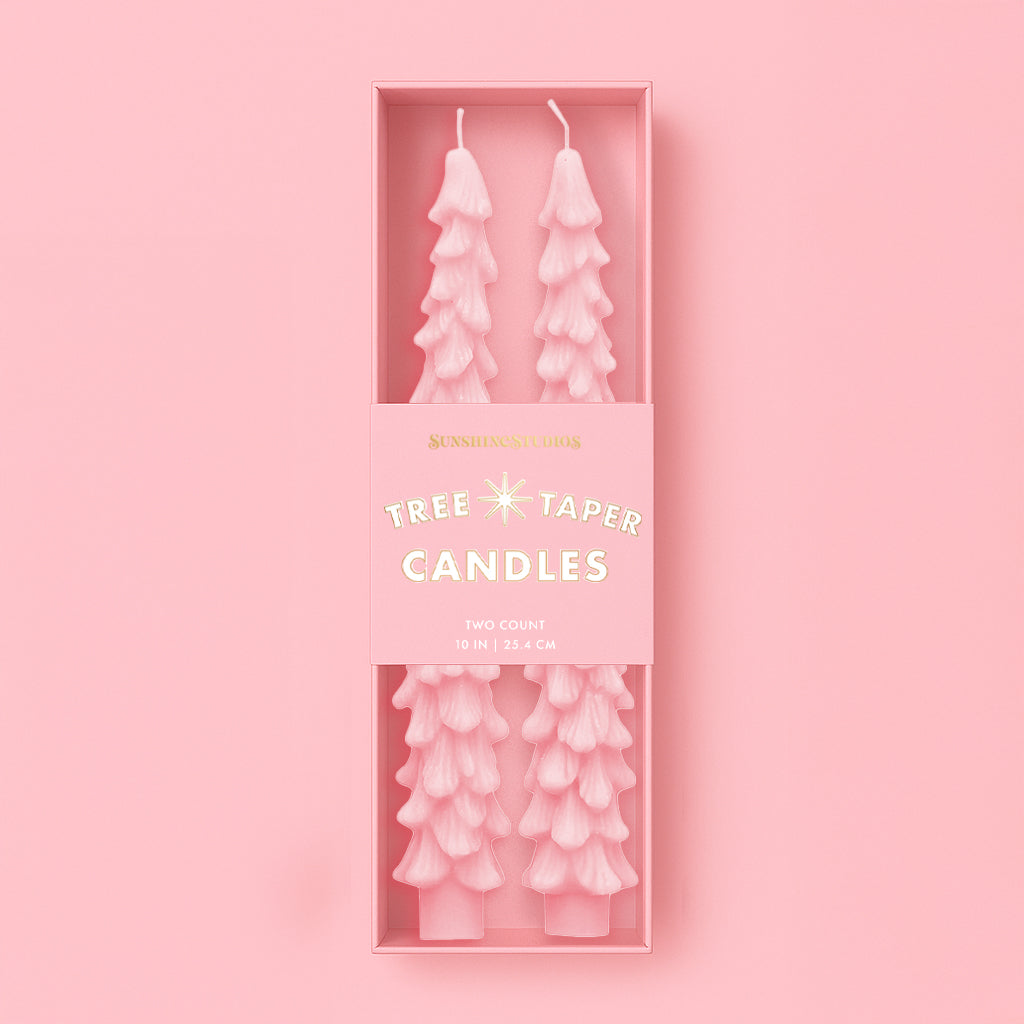 A pink set of taper candles in a tree shape. 