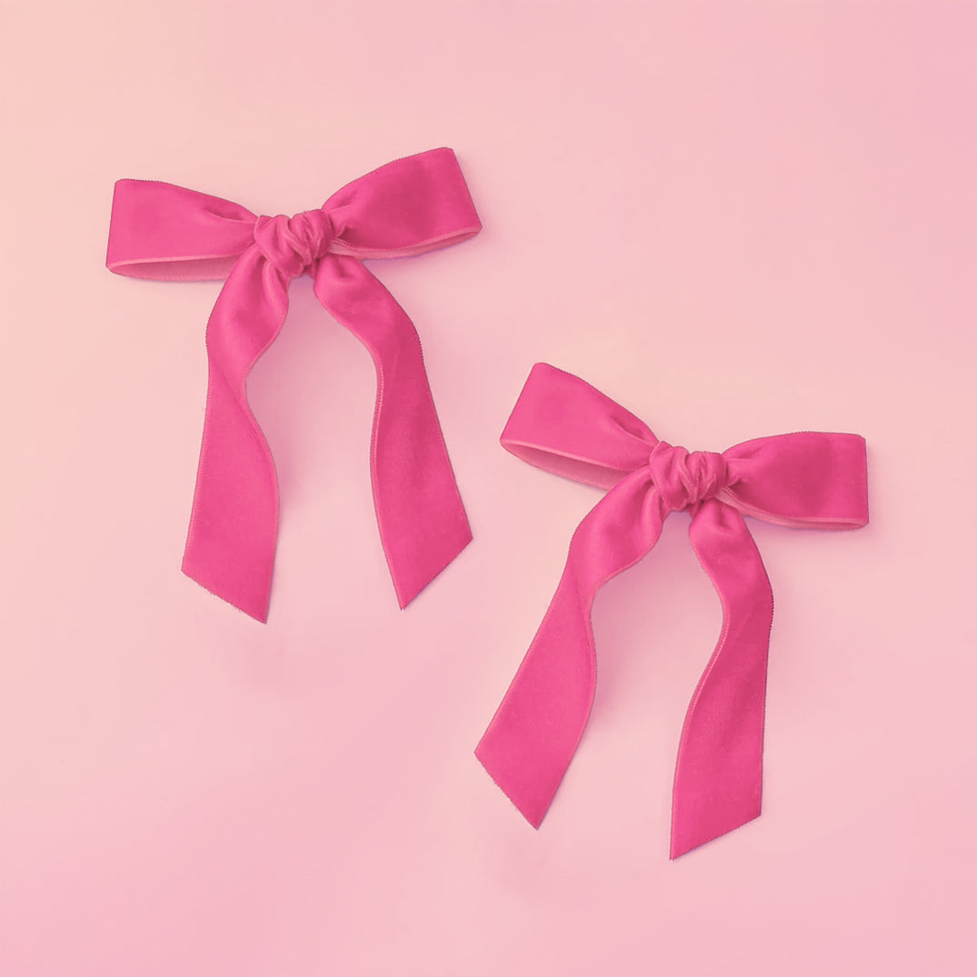 A pink set of hair bows. 