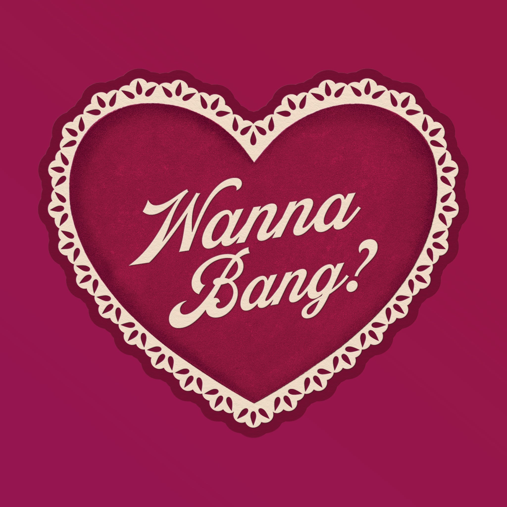 A dark pink heart shaped card with embossed text that reads, "Wanna Bang?". 