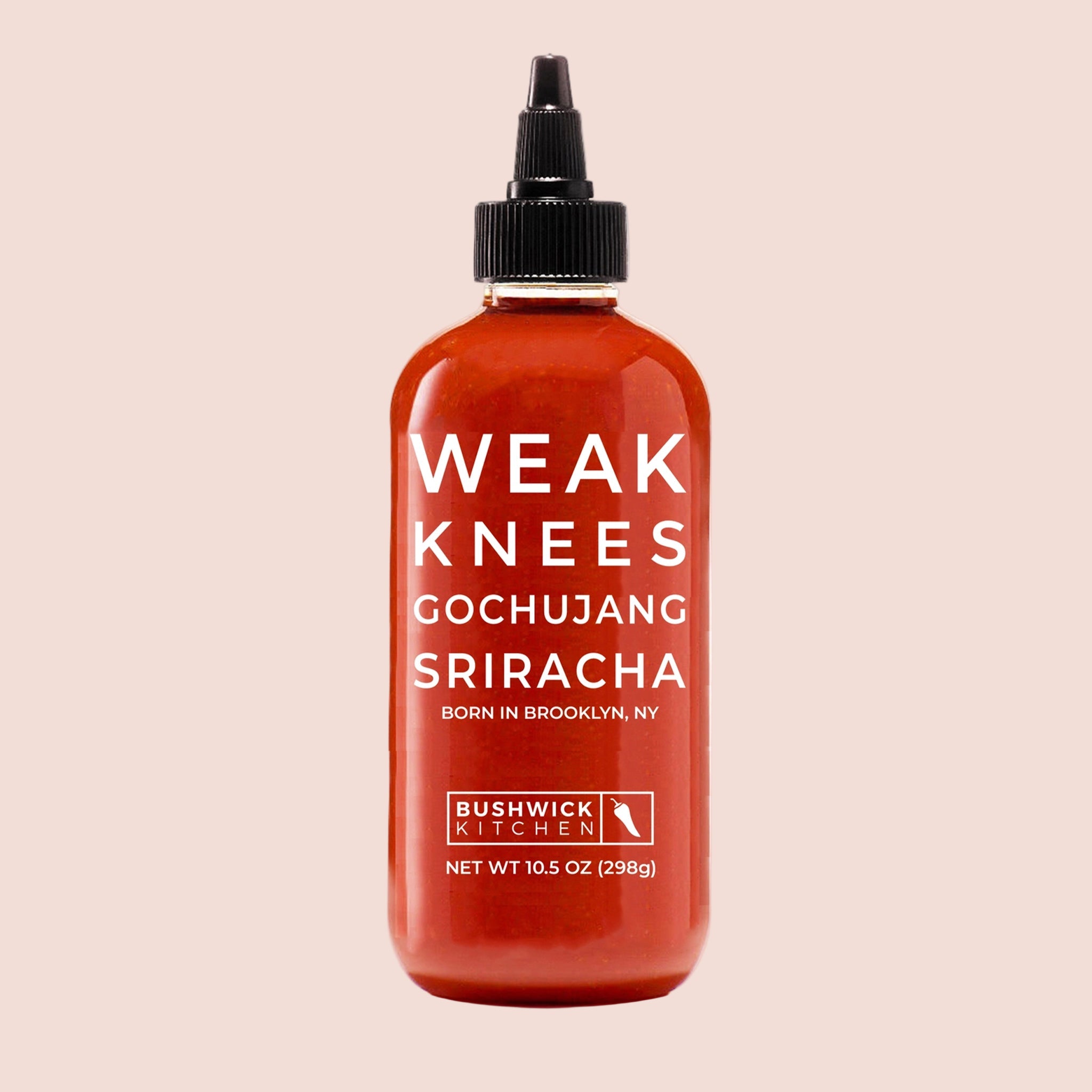 A bottle of red gochujang sriracha. 