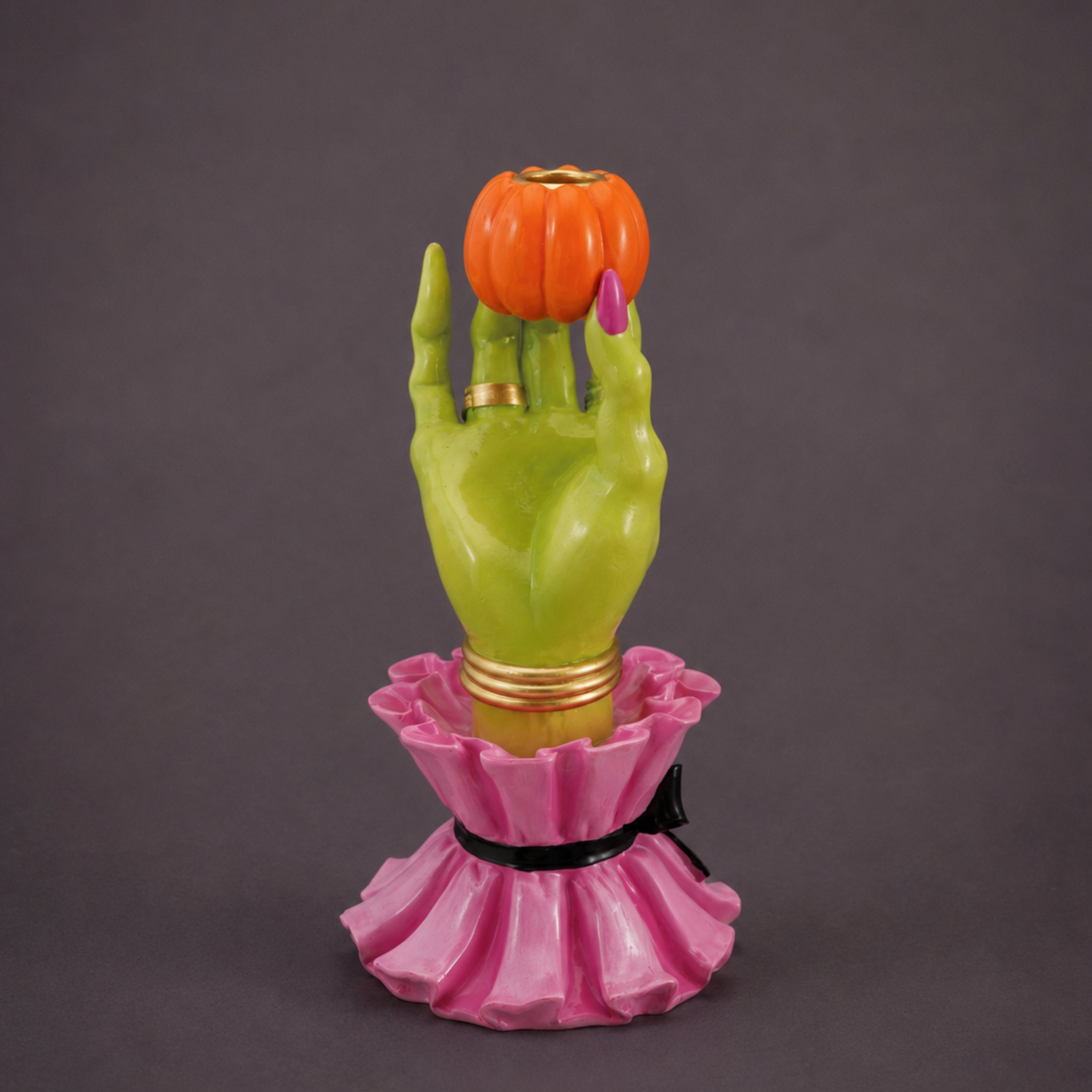 a witch hand taper holder
