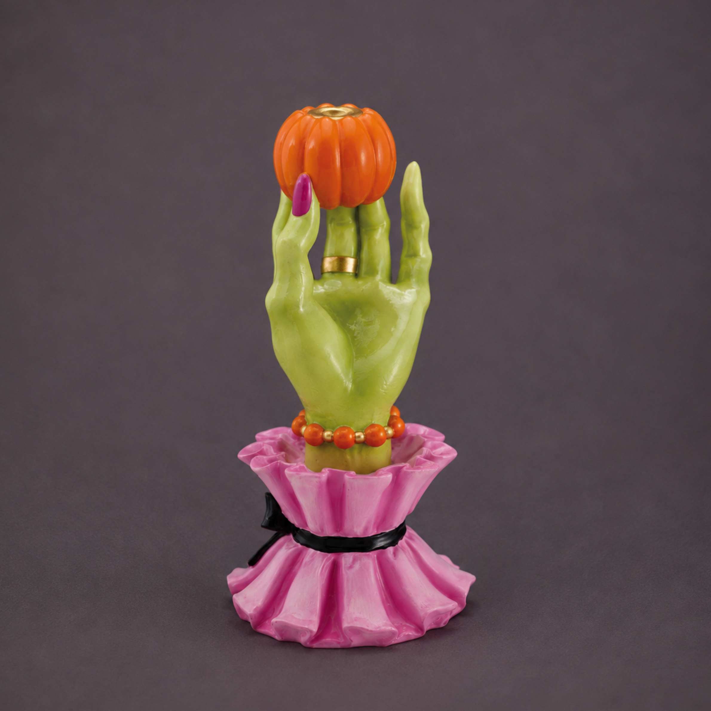 a witch hand taper holder