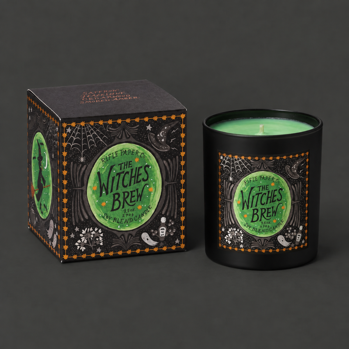 A black jar candle with a green label that reads, "The Witches Brew". 