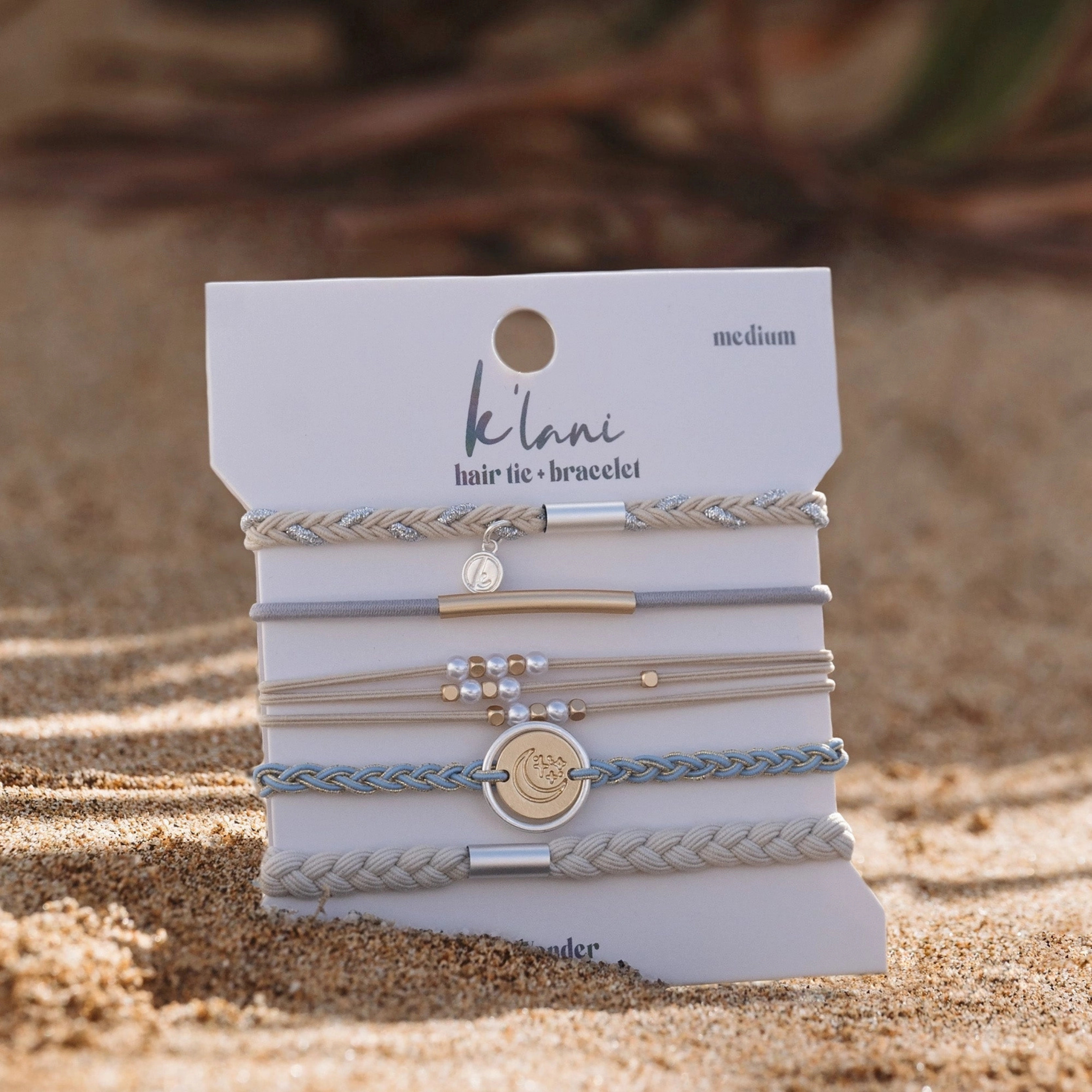 a pack of five beachy hair tie bracelets. 