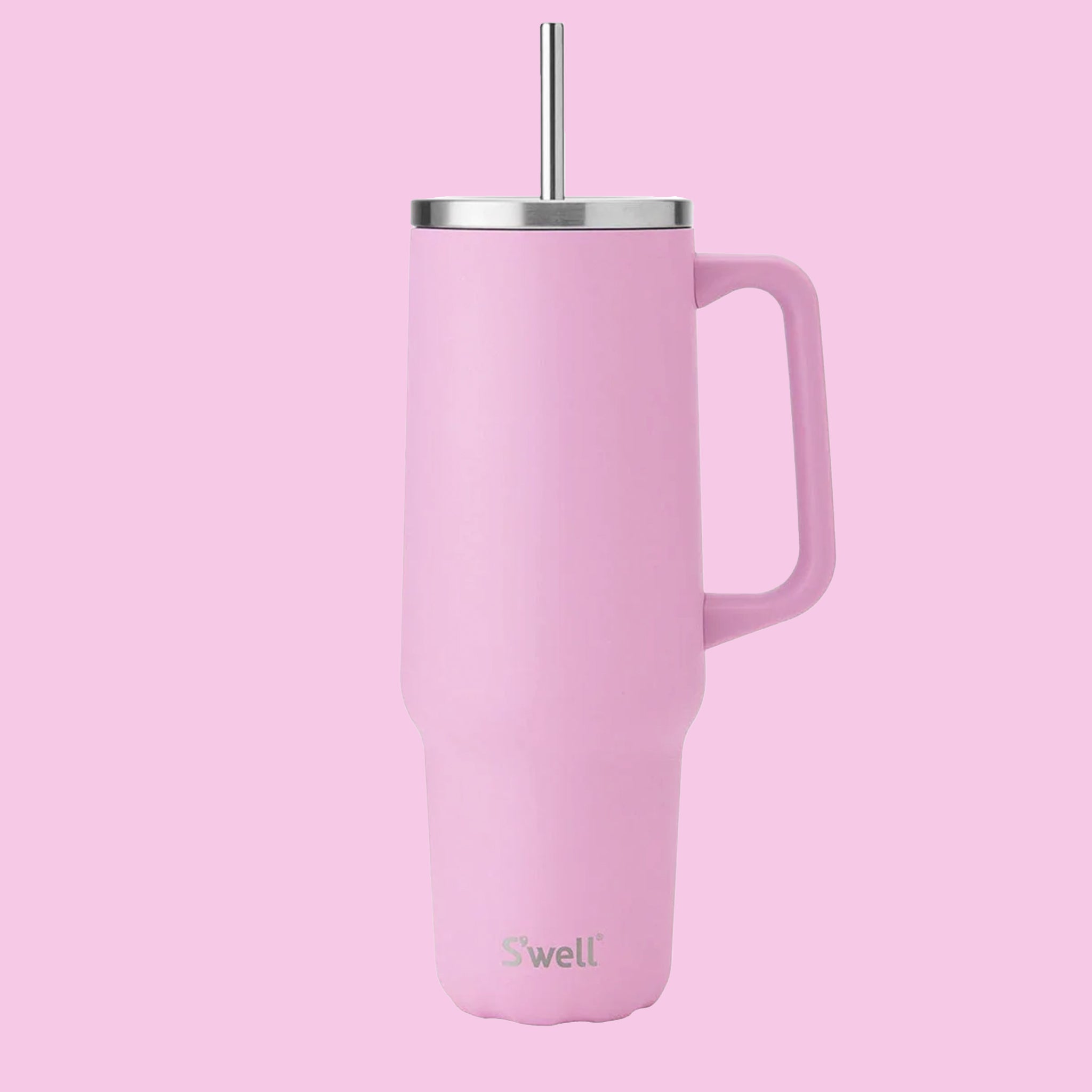 A pink tumbler with a handle and silver straw and lid. 