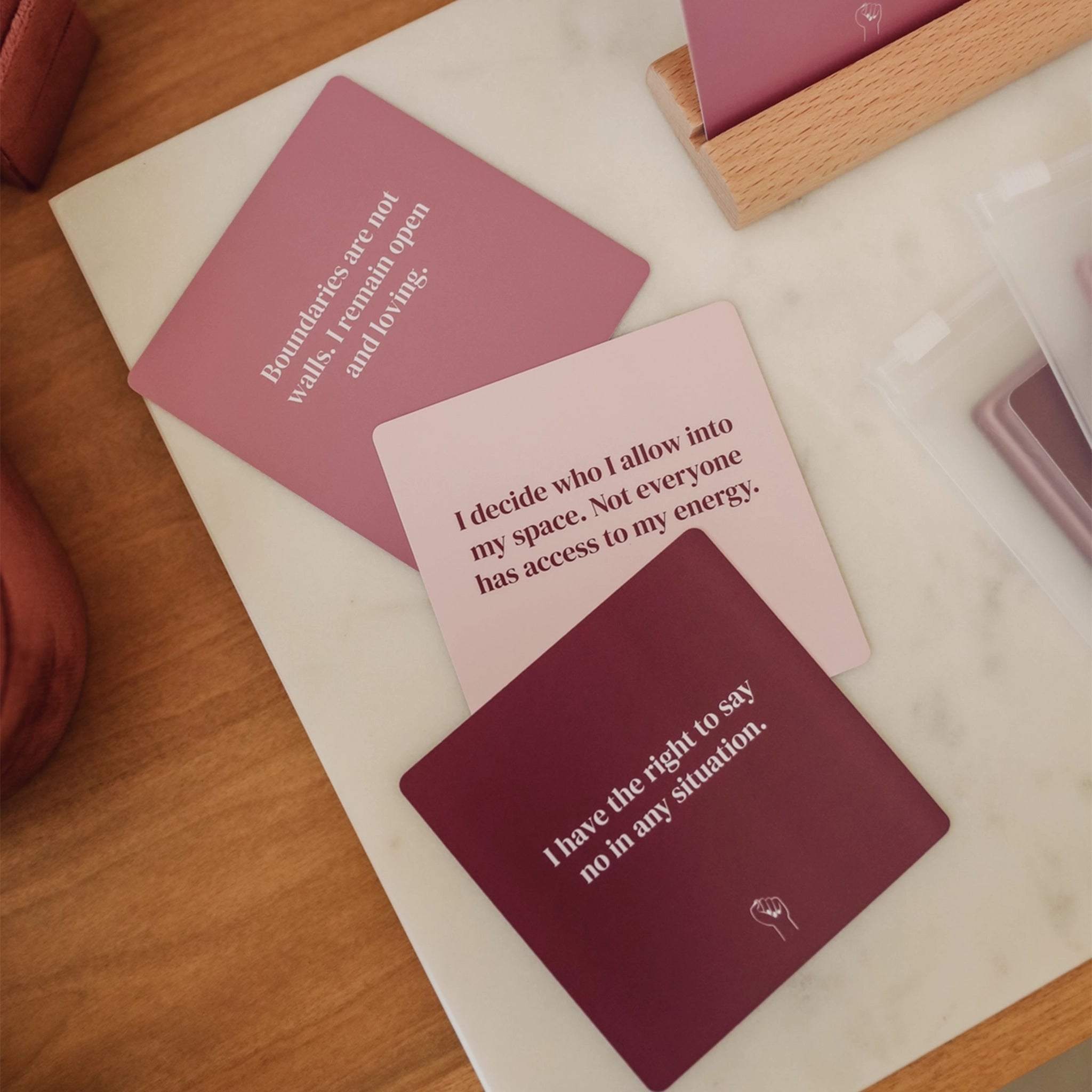 Different shades of purple cards with affirmations on the theme of boundaries that stick to your shower wall when wet.