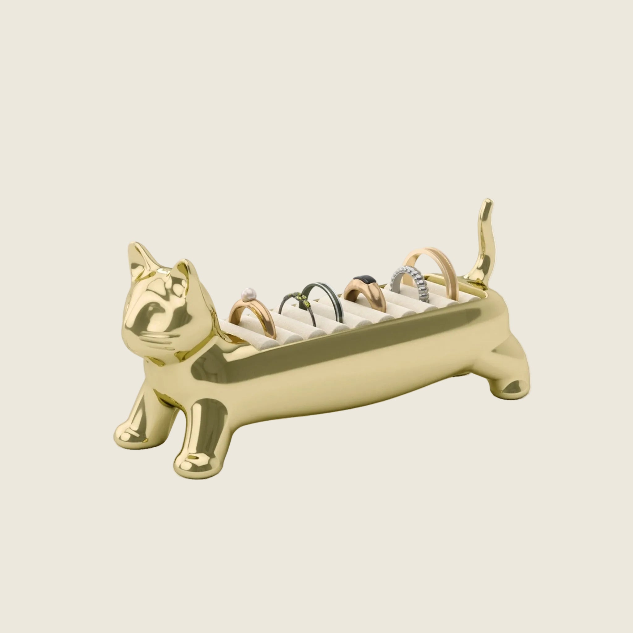 A gold cat shaped ring holder. 