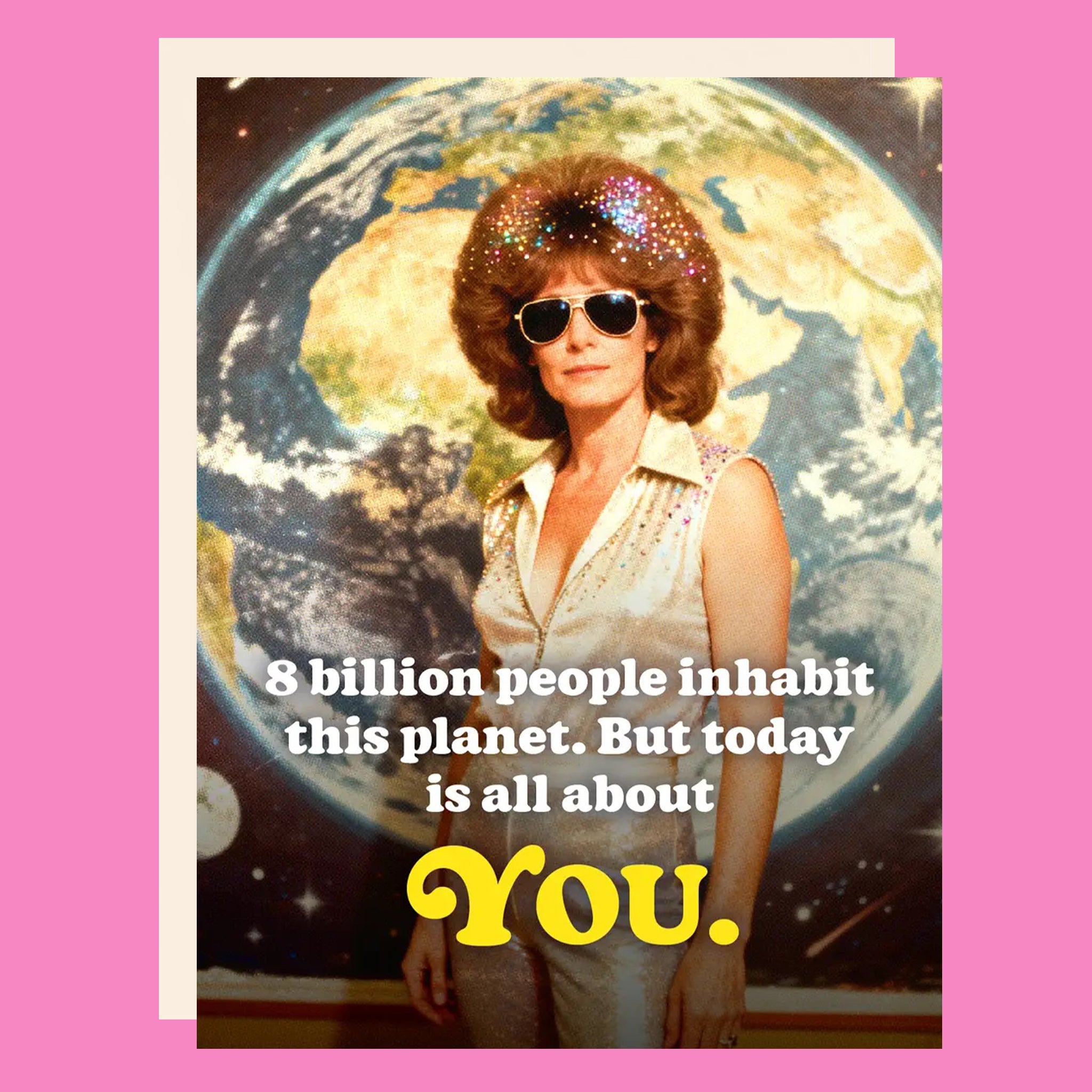Greeting card with a disco woman on the front, standing in front of a photo of the world. The card reads "8 billion people inhabit this plant. But today is all about you."