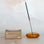 An amber colored glass bubble incense holder. Incense not included. 