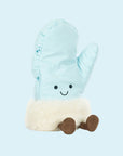 A light blue mitten shaped stuffed toy with a smiling face and legs. 