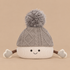 A beanie shaped plush character with arms and a smiling face. 