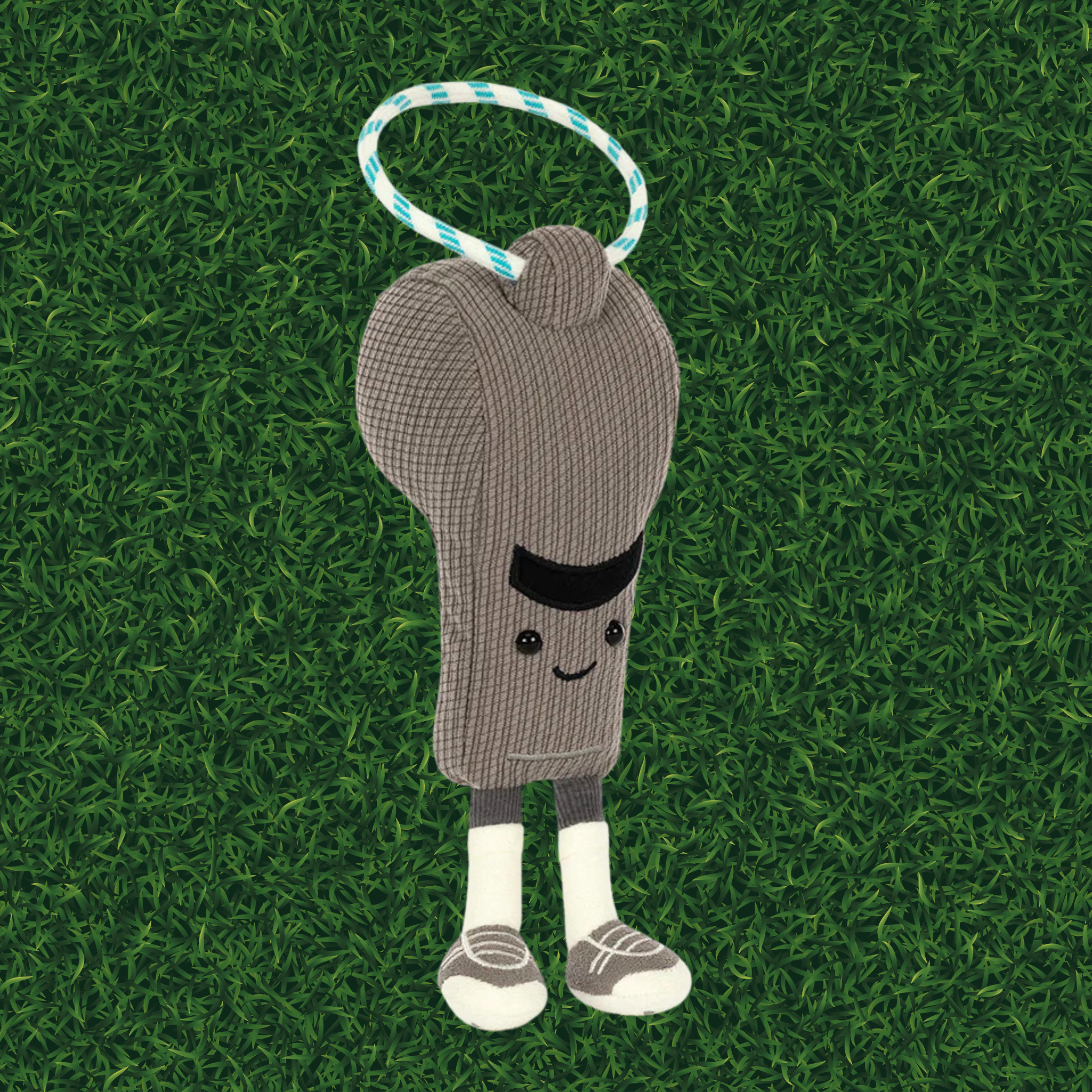 Gray whistle shaped stuffed toy with a smiling face and legs and feet.