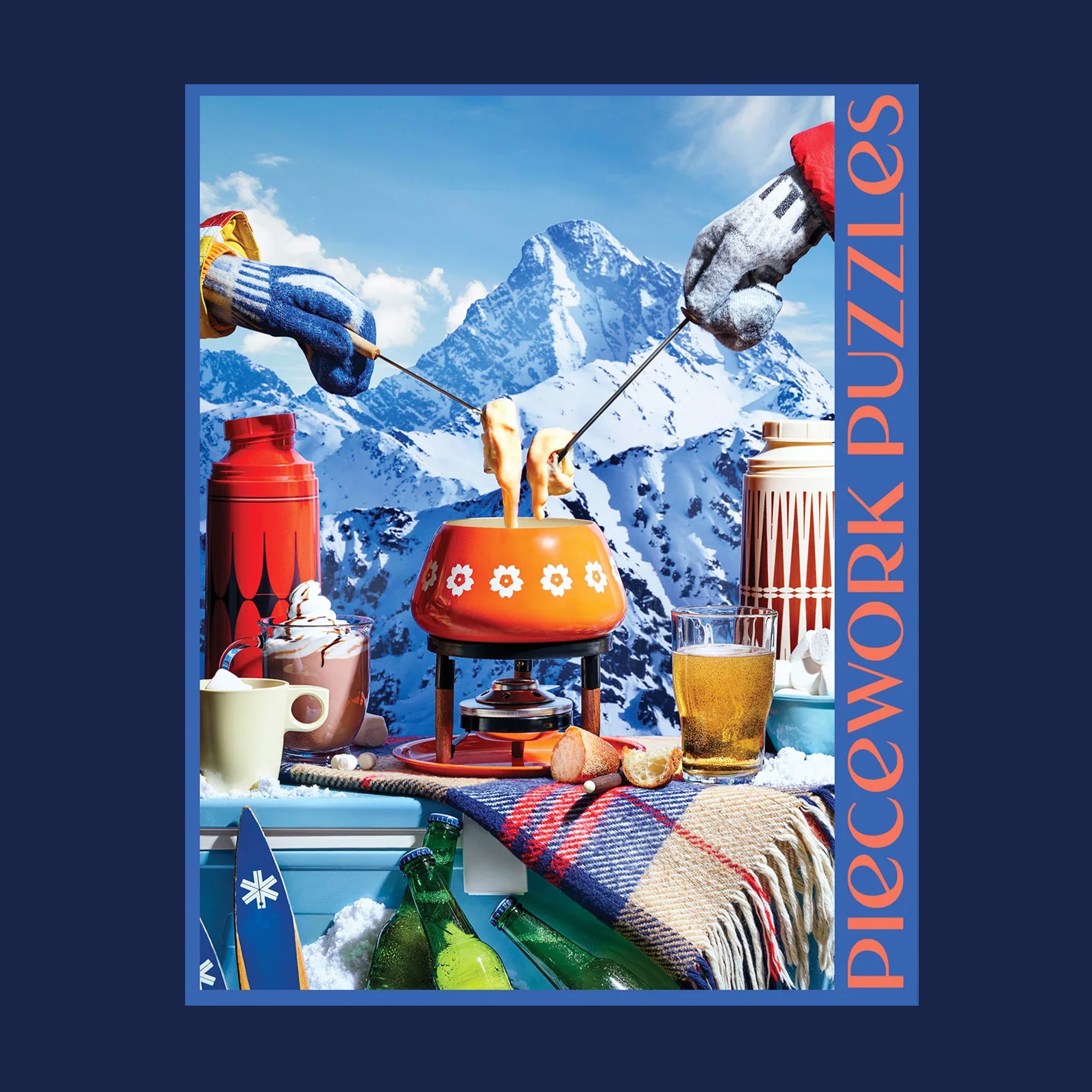 A look at the finished puzzle featuring an image of a mountain range and a vintage fondue pot along with other warm beverages.
