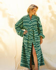 A green toweling robe. 