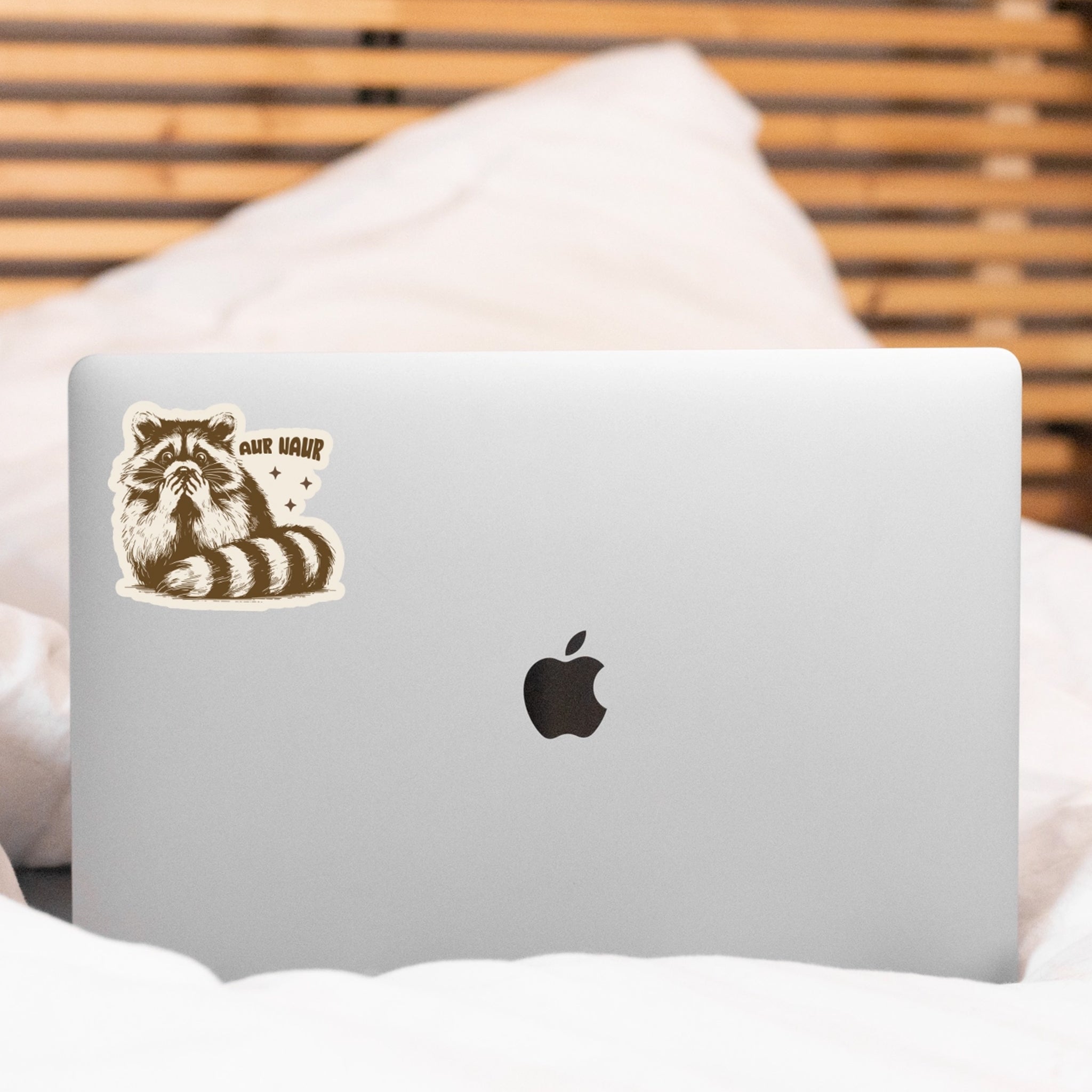 A raccoon sticker "Aur Naur". 