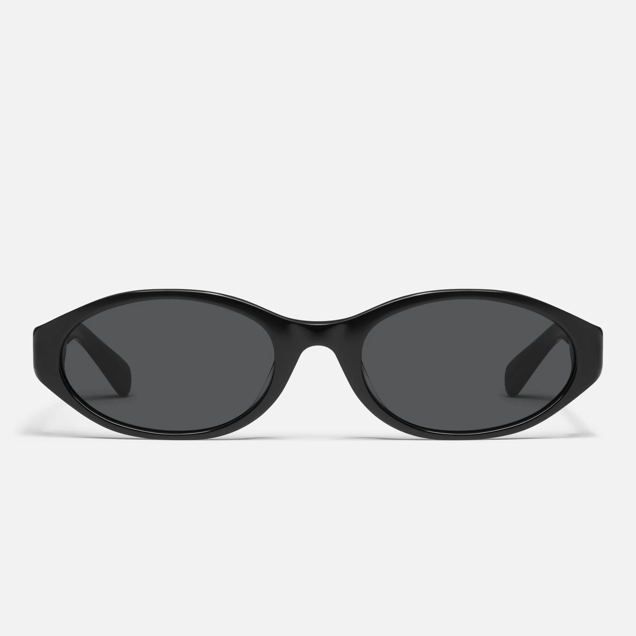 A pair of black oval shaped sunglasses with a dark grey lens. 