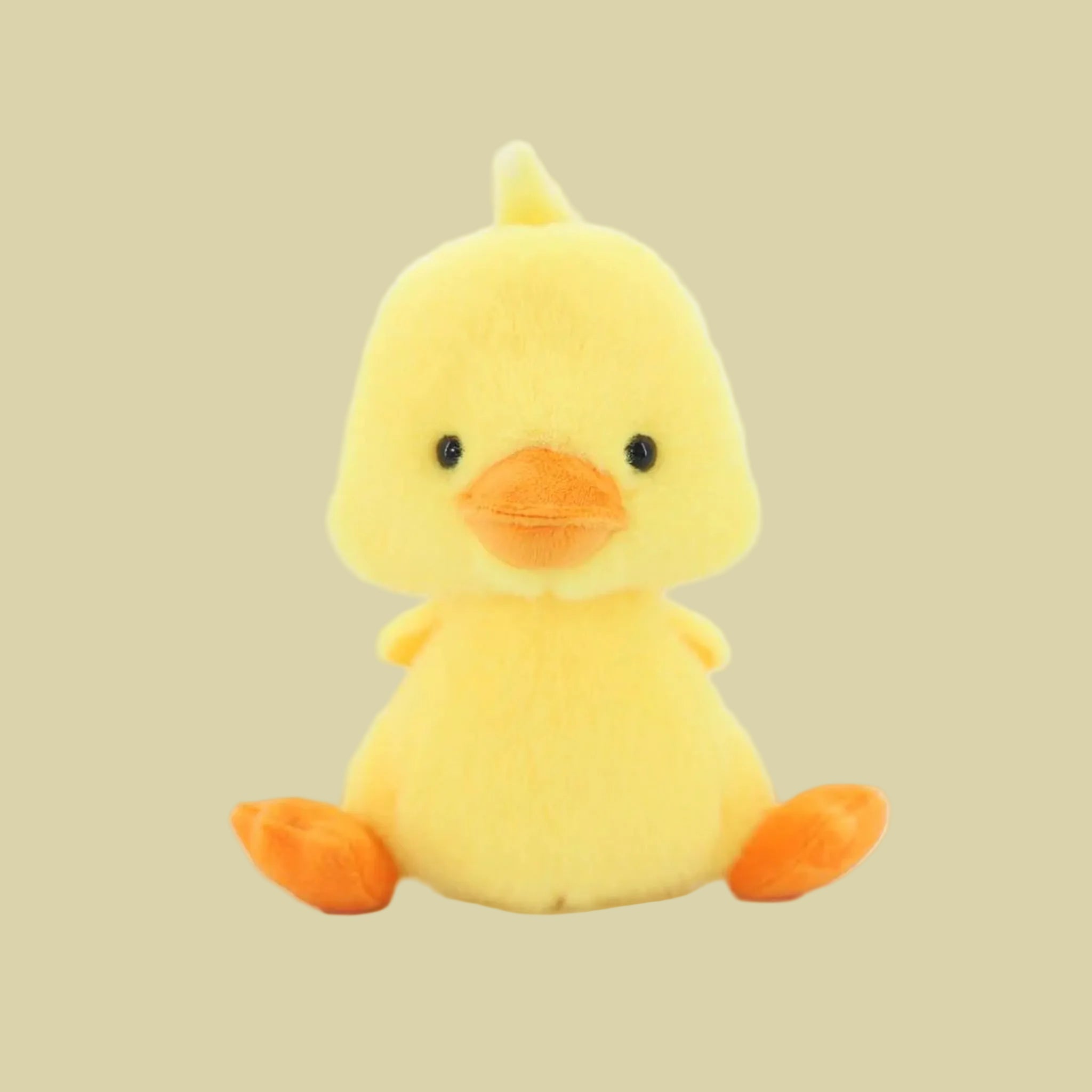 A yellow baby chicken shaped stuffer animal. 