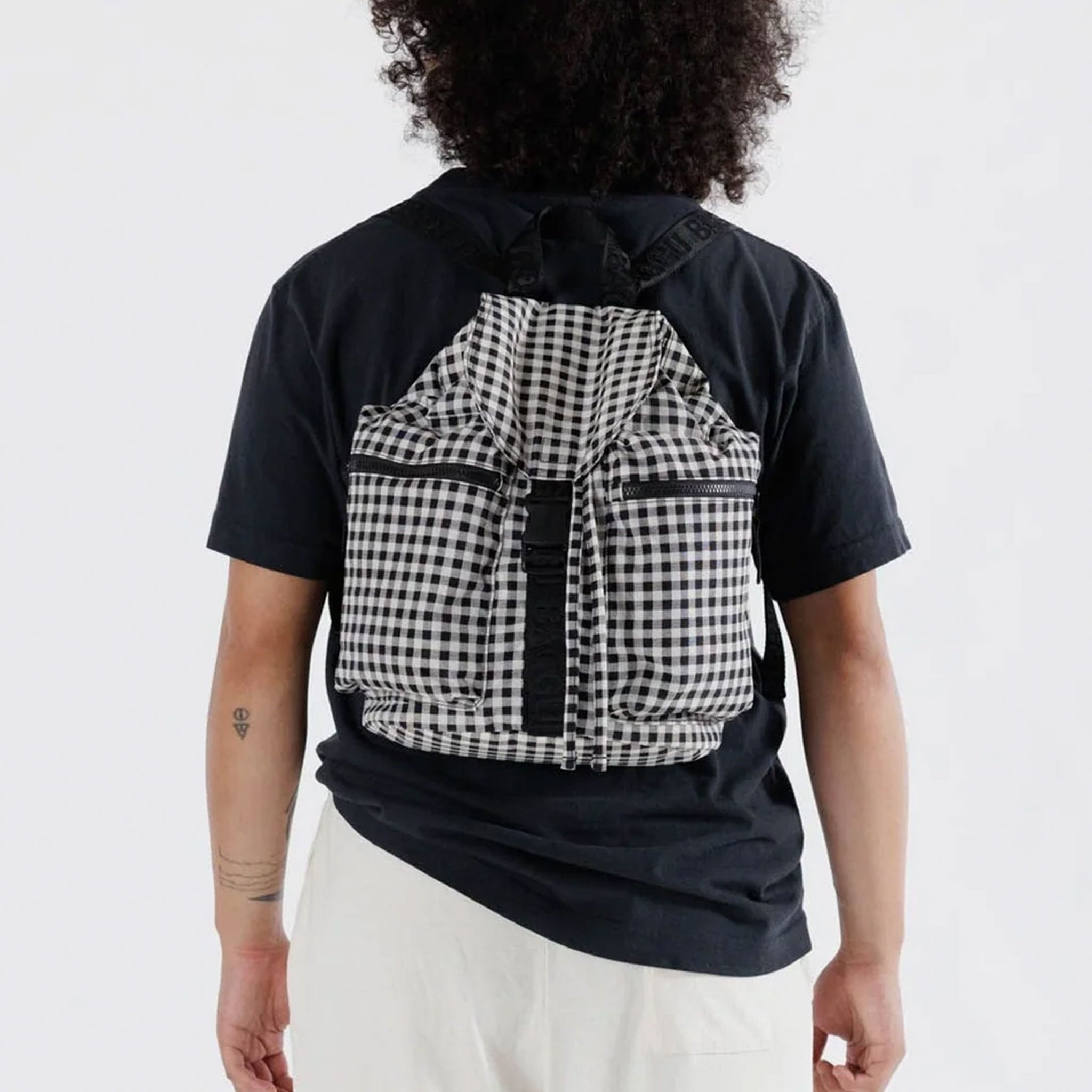 a black and white gingham backpack