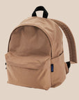 A nylon backpack in a tannish brown color with black straps and two front zipper compartments. 