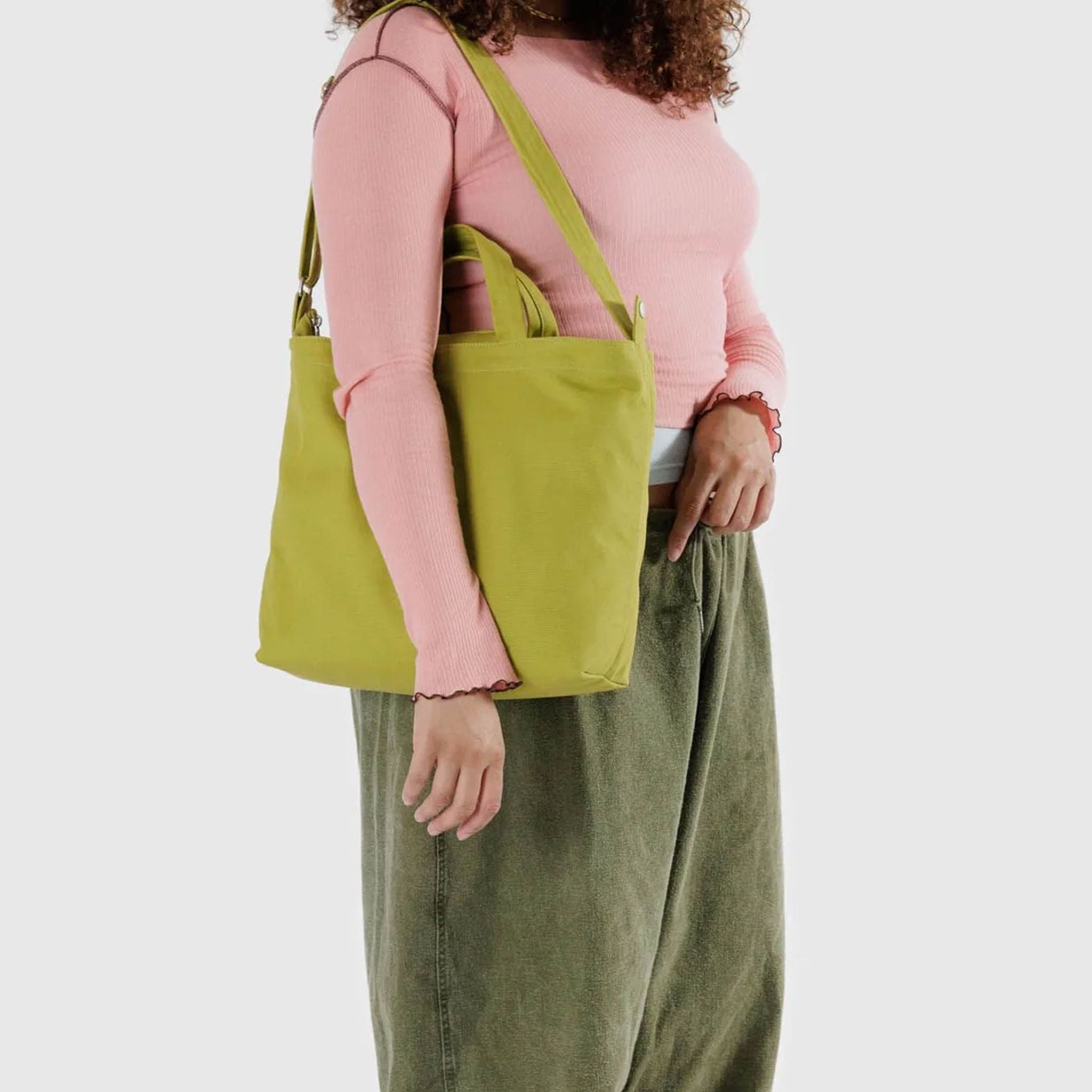 a lime green canvas shoulderbag