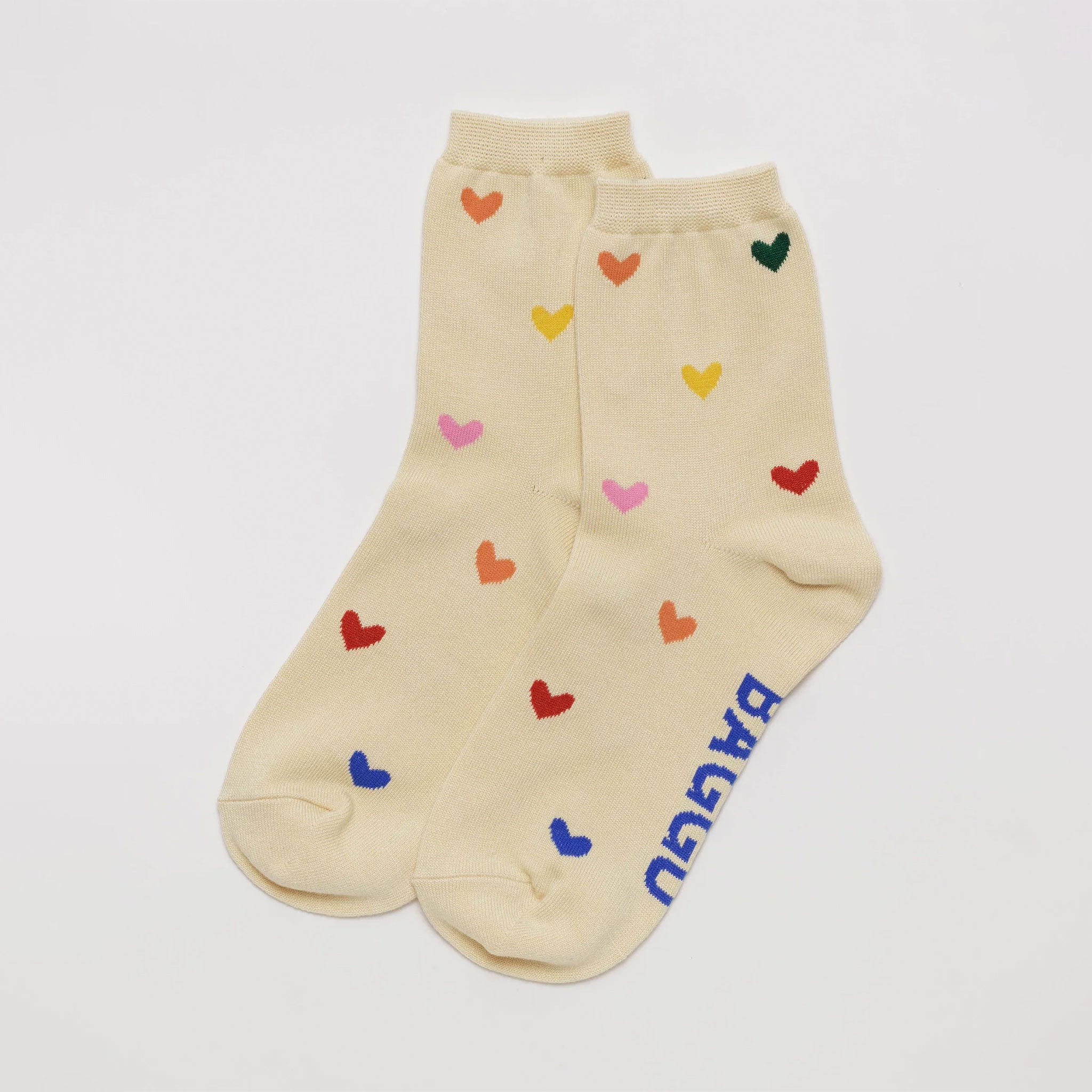 neutral socks witch small colorful hearts