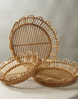 Three flower shaped baskets trays, each sold separately. 