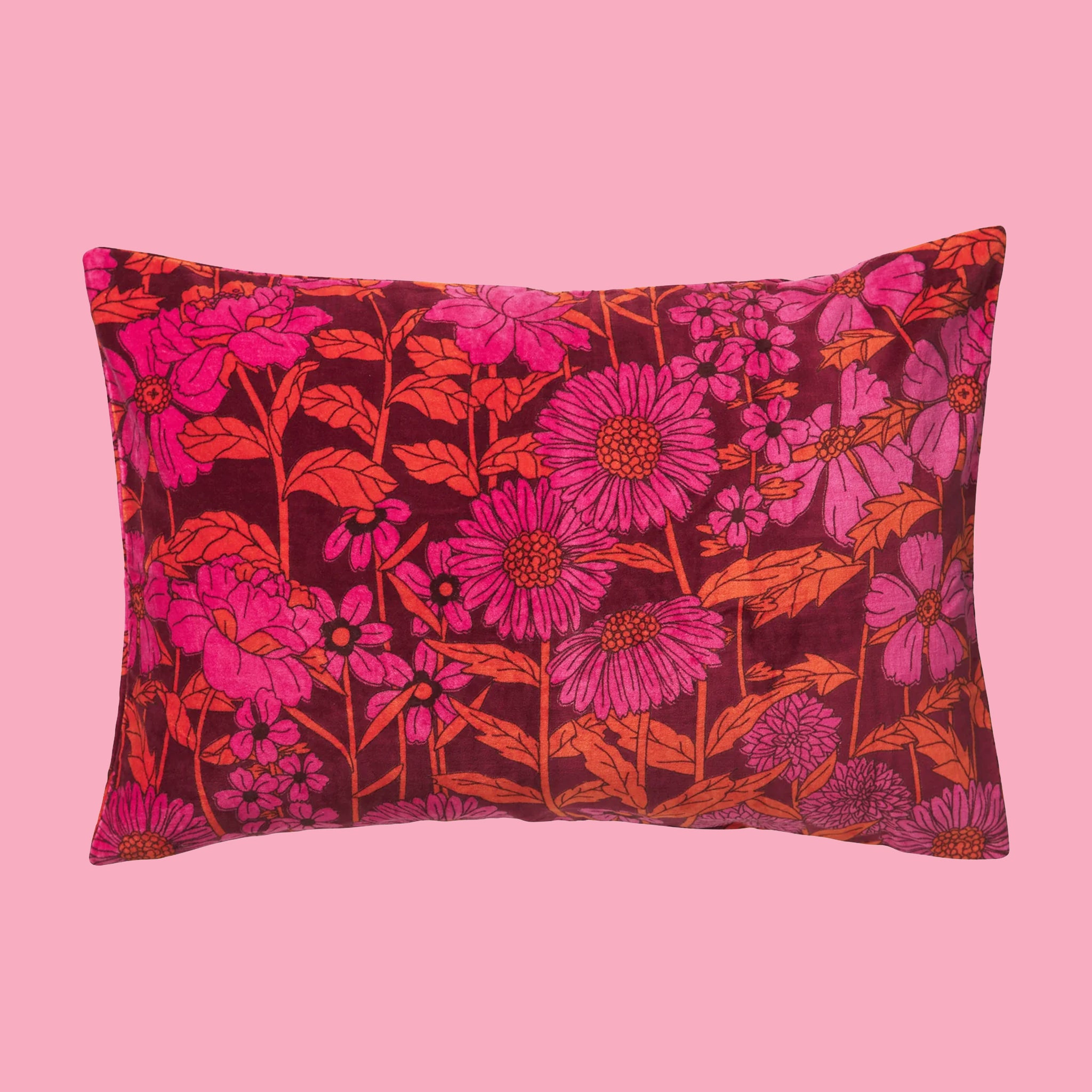 A pink and orange floral print pillowcase. 