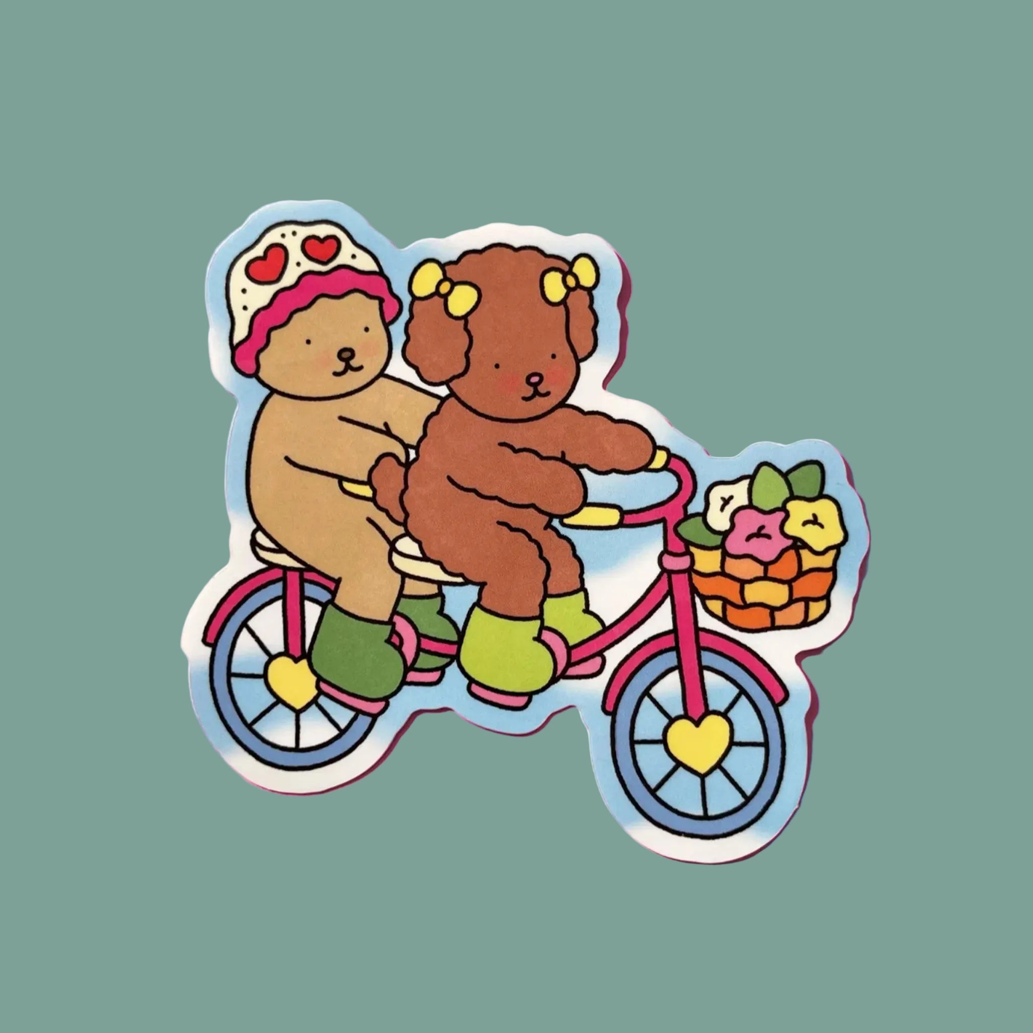 a bobbie goods sticker with characters riding on a bike. 