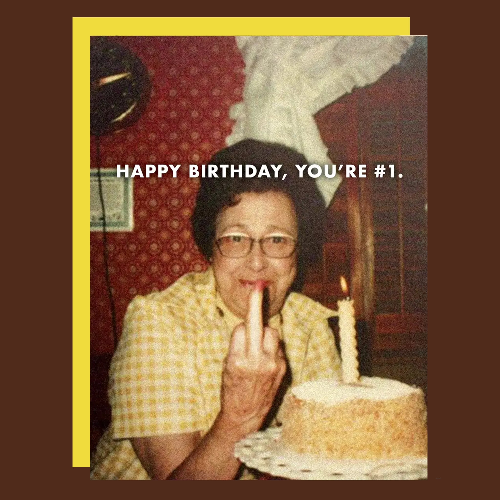 A card that reads, 'Happy Birthday, You're #1' along with vintage looking photo of a woman flipping off the camera. 