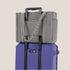 A black and white small puffy carry on tote bag. 