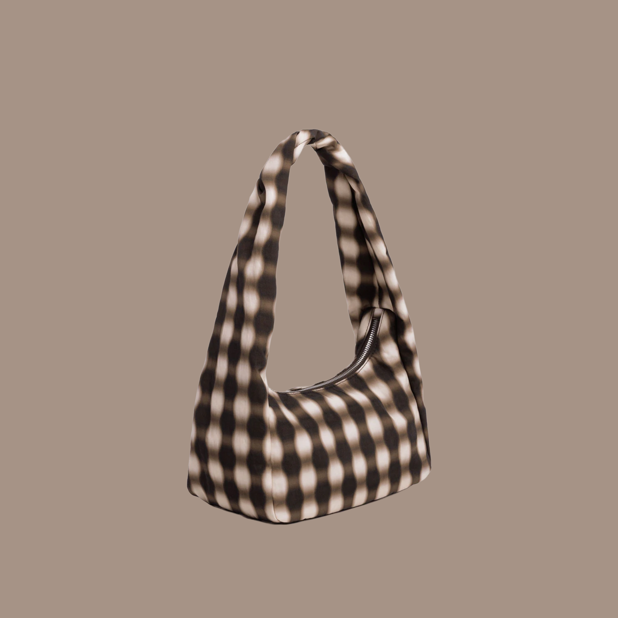 blurred brown gingham detailed nylon purse with zipper.
