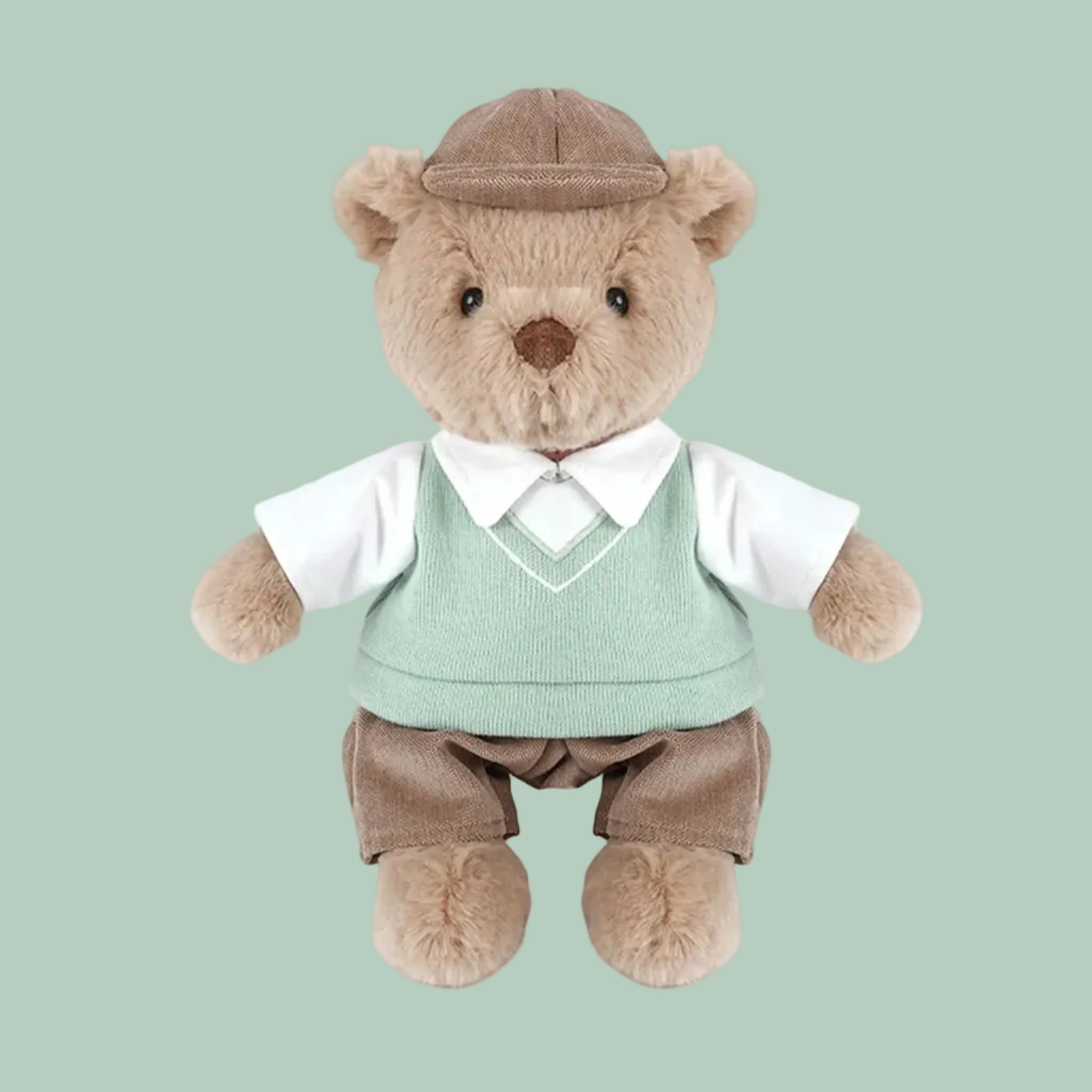 A green and tan golfer dressed bear. 