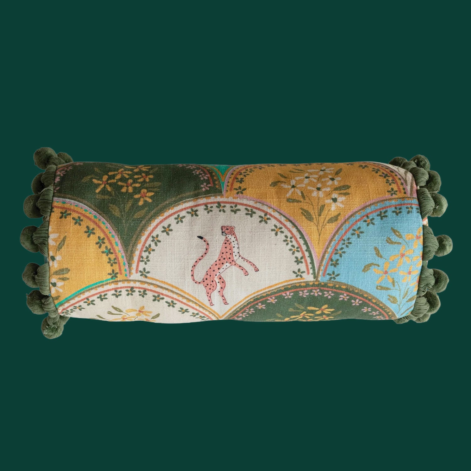 A floral and cheetah patterned bolster pillow. 