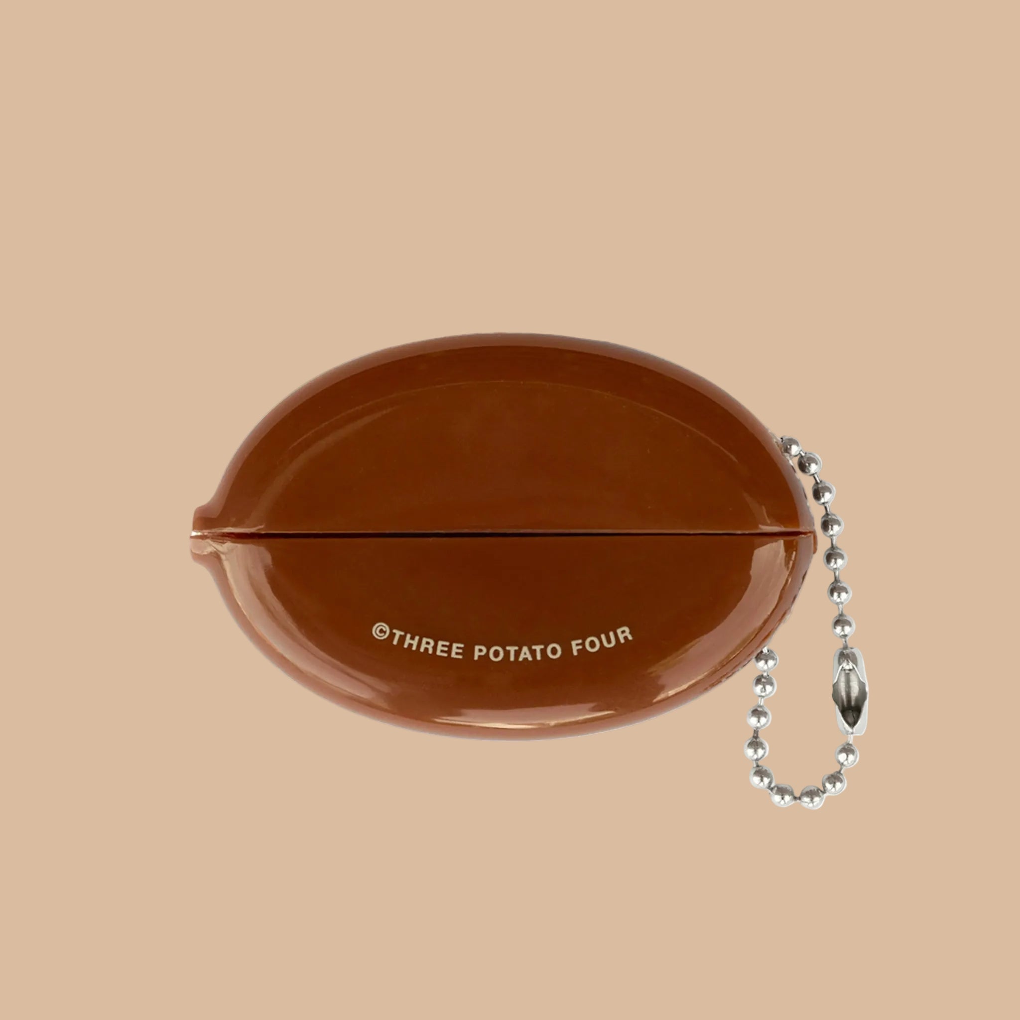 Brown coin purse with 'BOOK MONEY' text on a brown background.