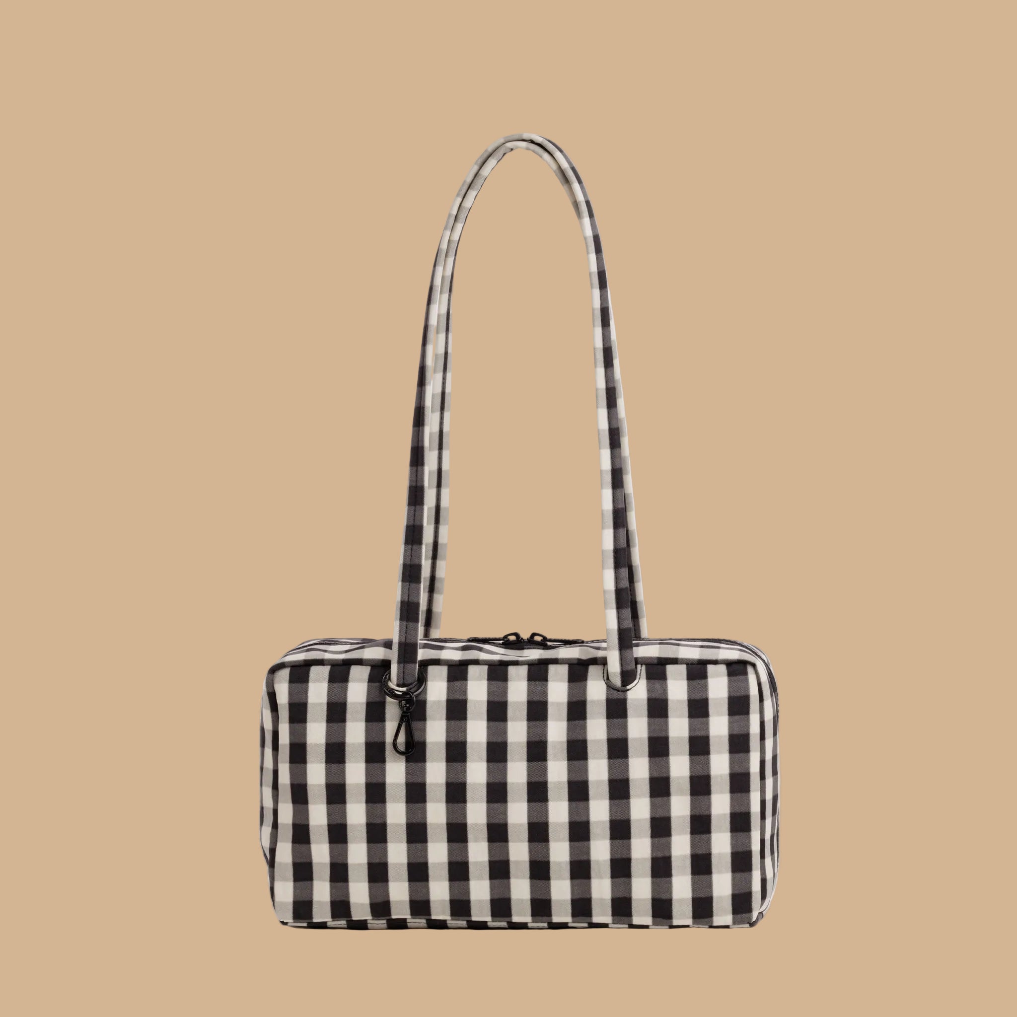 A cream and black gingham print shoulder bag.