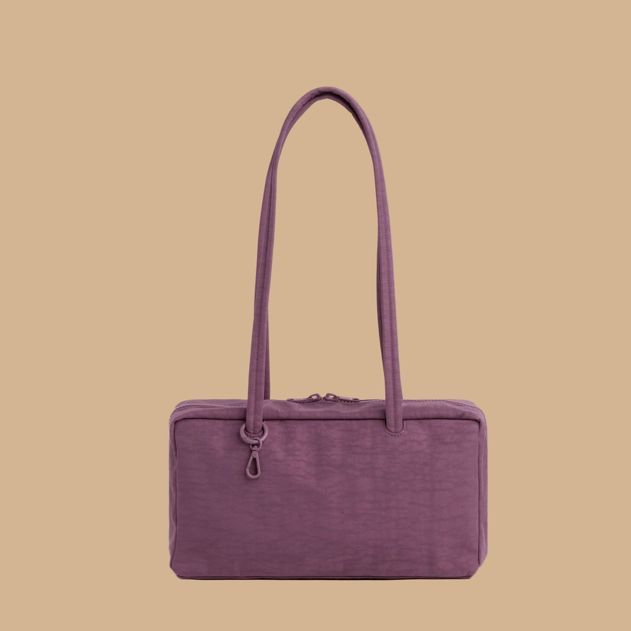 A purple rectangle shaped shoulder bag.