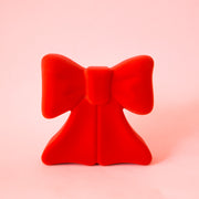A red velvet bow shaped storage box.