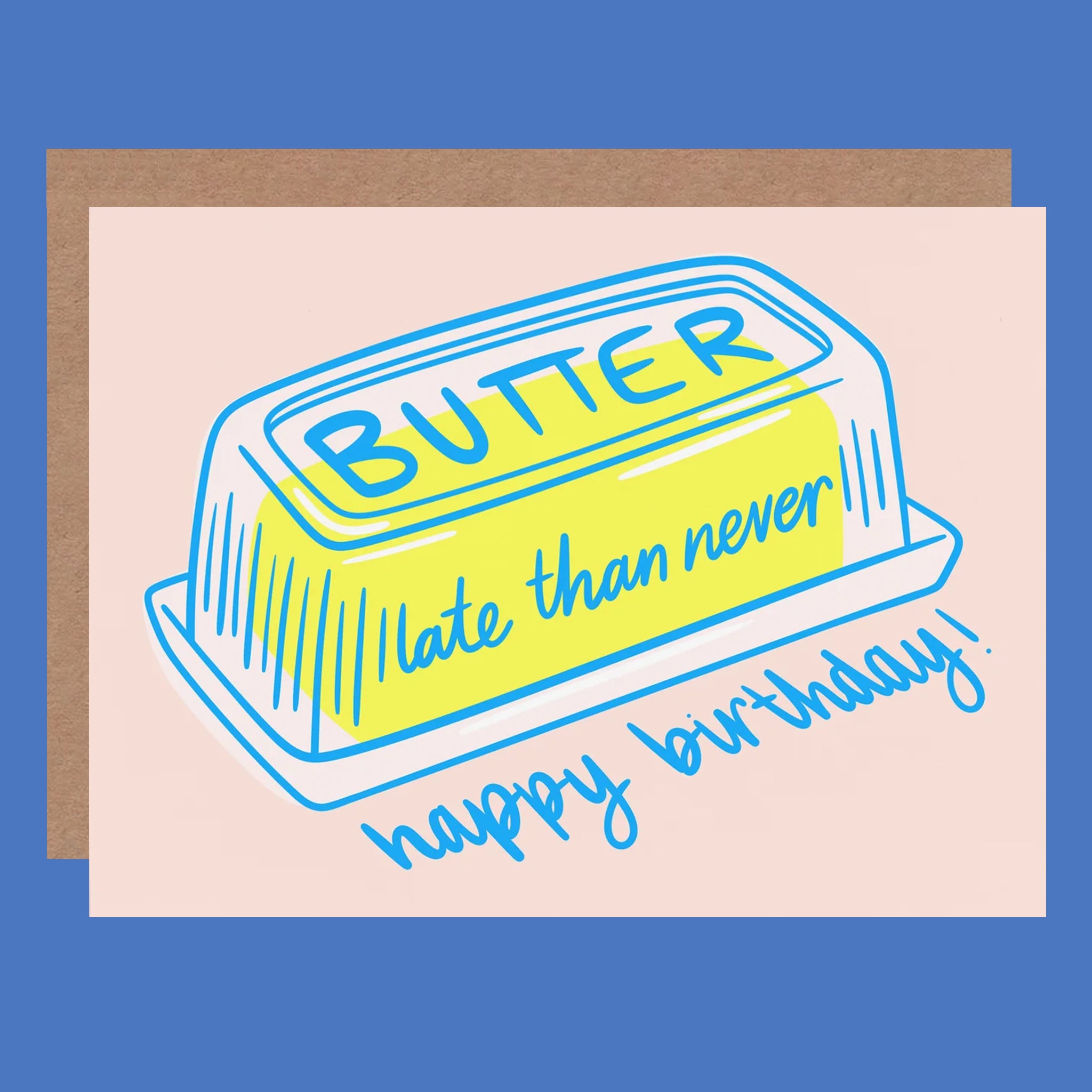 A birthday card with a butter illustration and blue text that reads 'BUTTER late than never happy birthday'. The card is pink, and there's a brown envelope included.