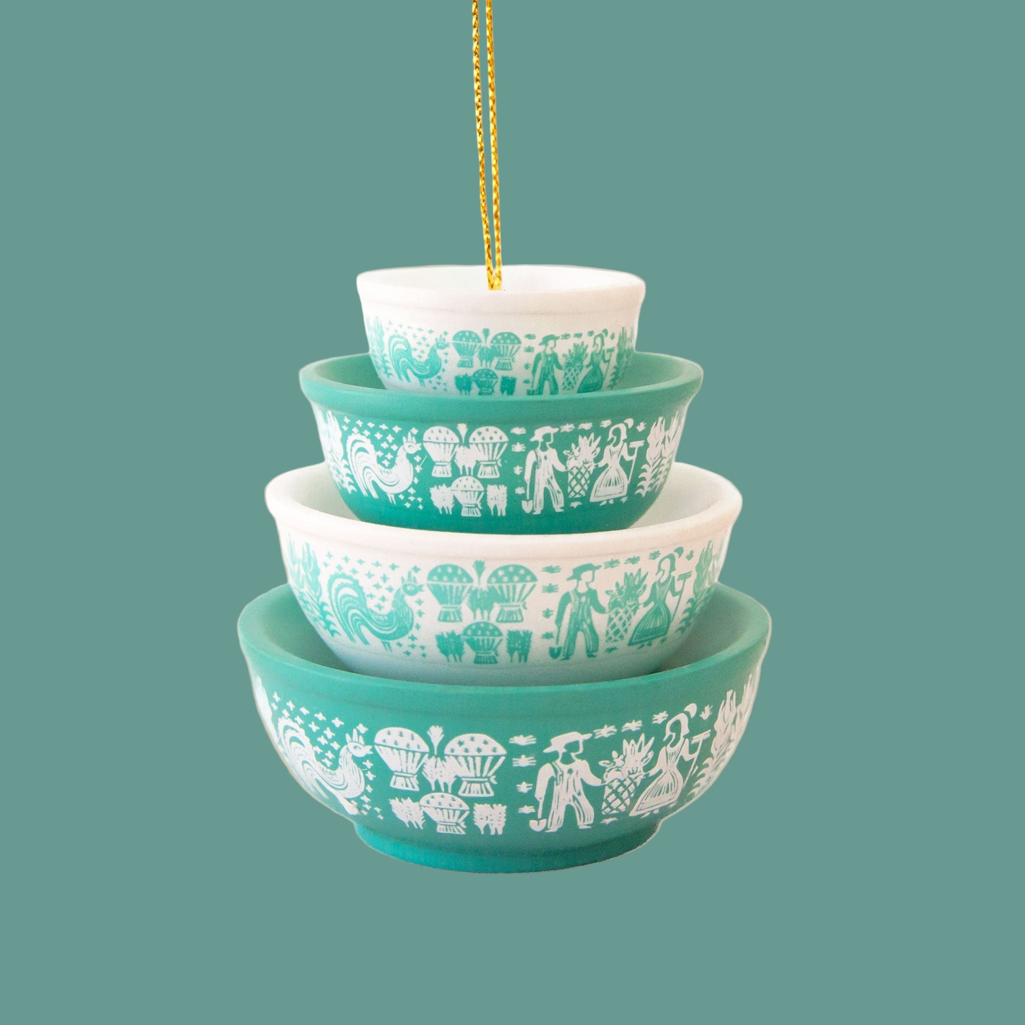 A blue and white  colored ornament in the shape of stacked bowls. 