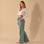 A pair of green cotton pants with a tie waistband. 