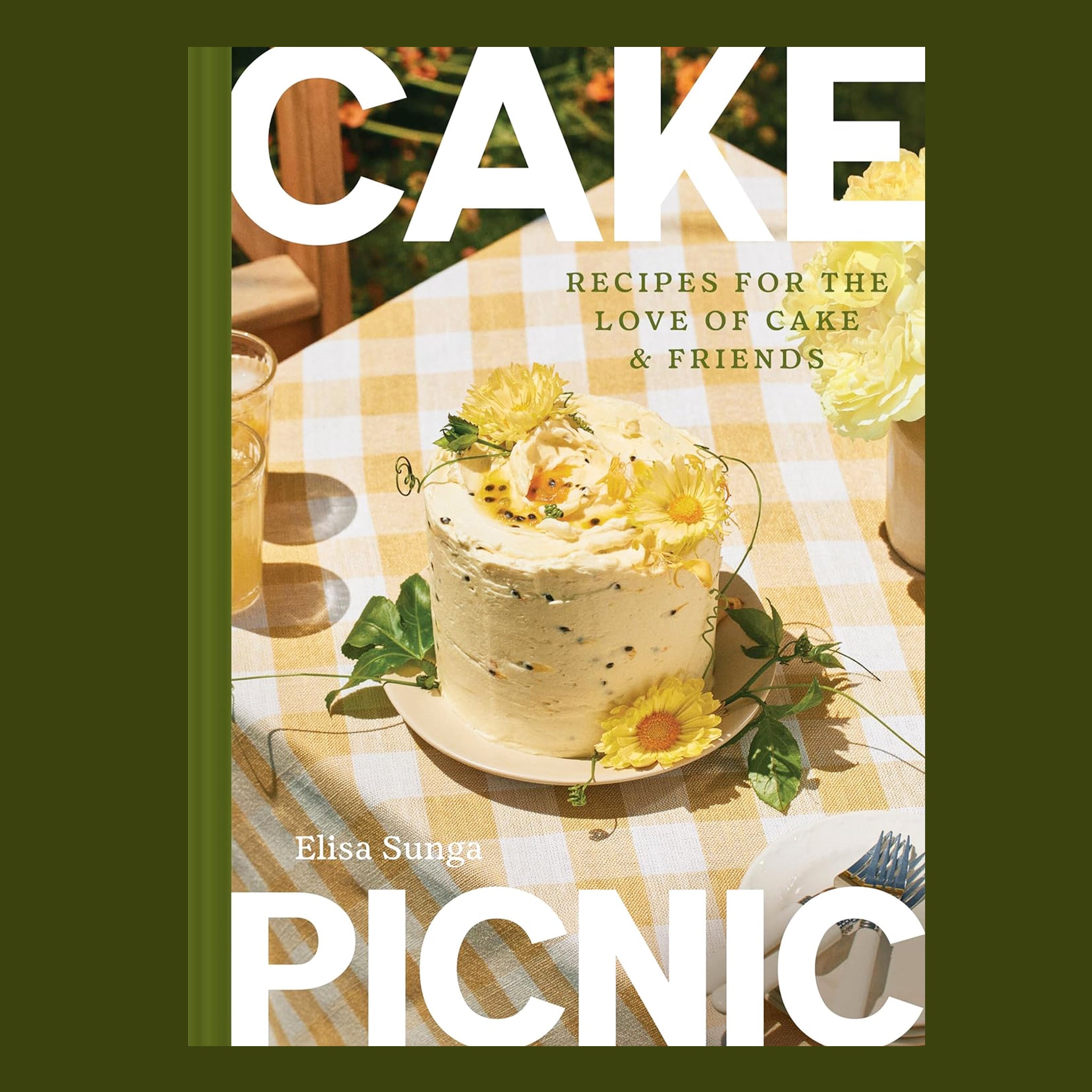 Book cover of 'Picnic Cake' with a cake on a table and flowers, featuring the author's name.