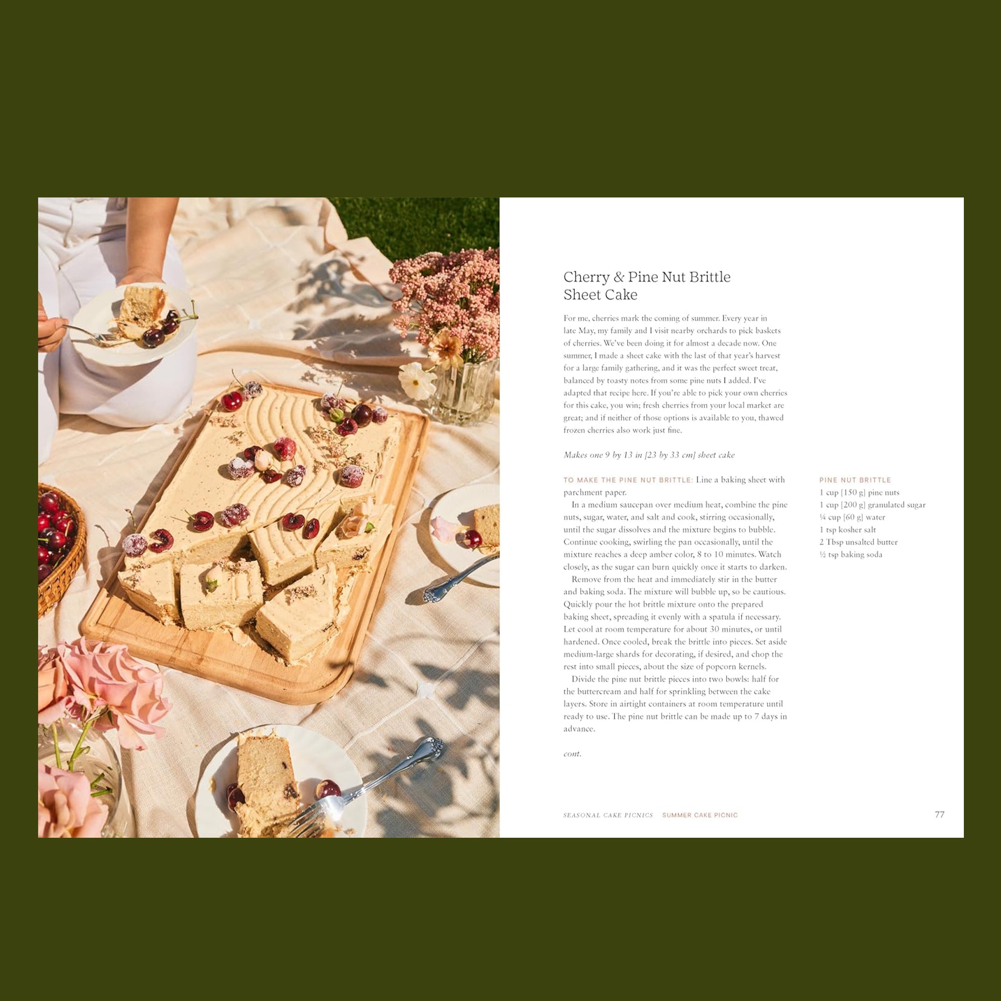 Cherry and Pine Nut Brittle Sheet Cake on a wooden board with a person in a white dress in the background.