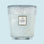 A large blue glass jar decorative jar candle. 
