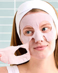A pink mud mask in a sheet mask form packaged in a two-toned pink packaging.