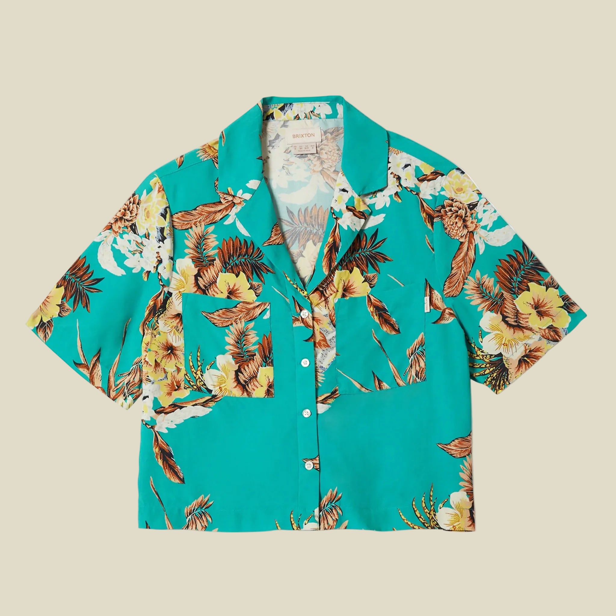 A teal and yellow tropical button up shirt. 