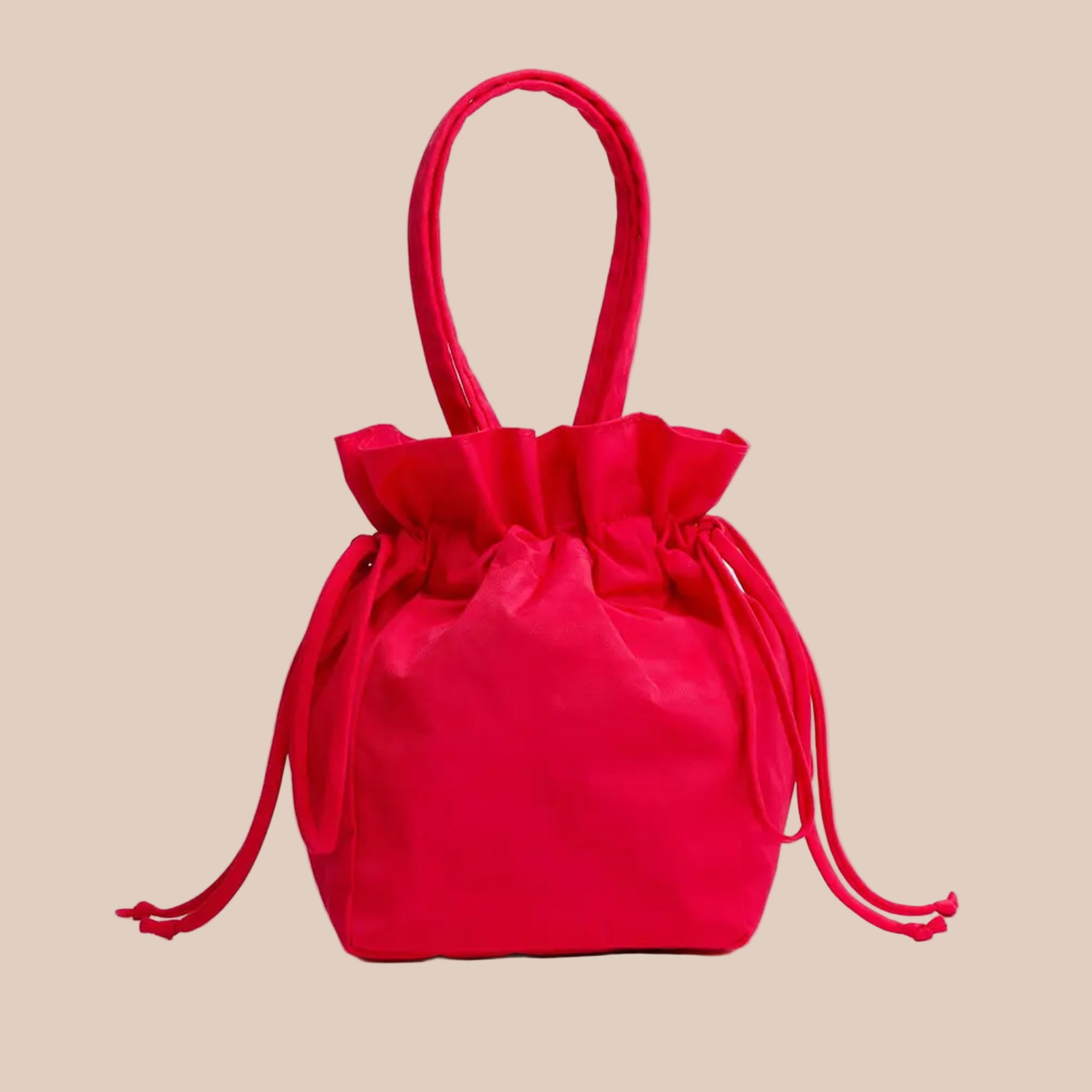 A bright red drawstring handbag. 