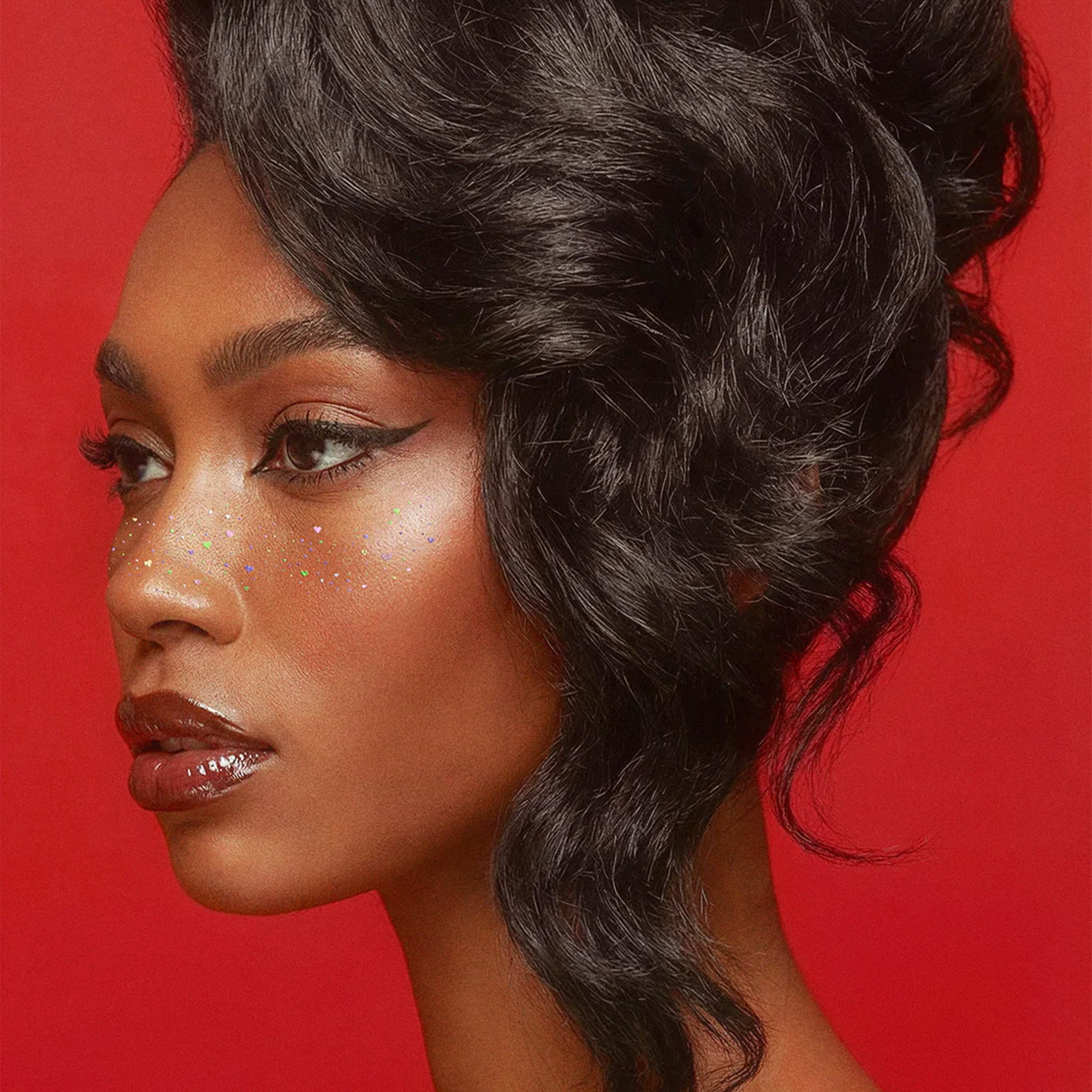 A set of sparkle heart shaped freckle makeup patches. 